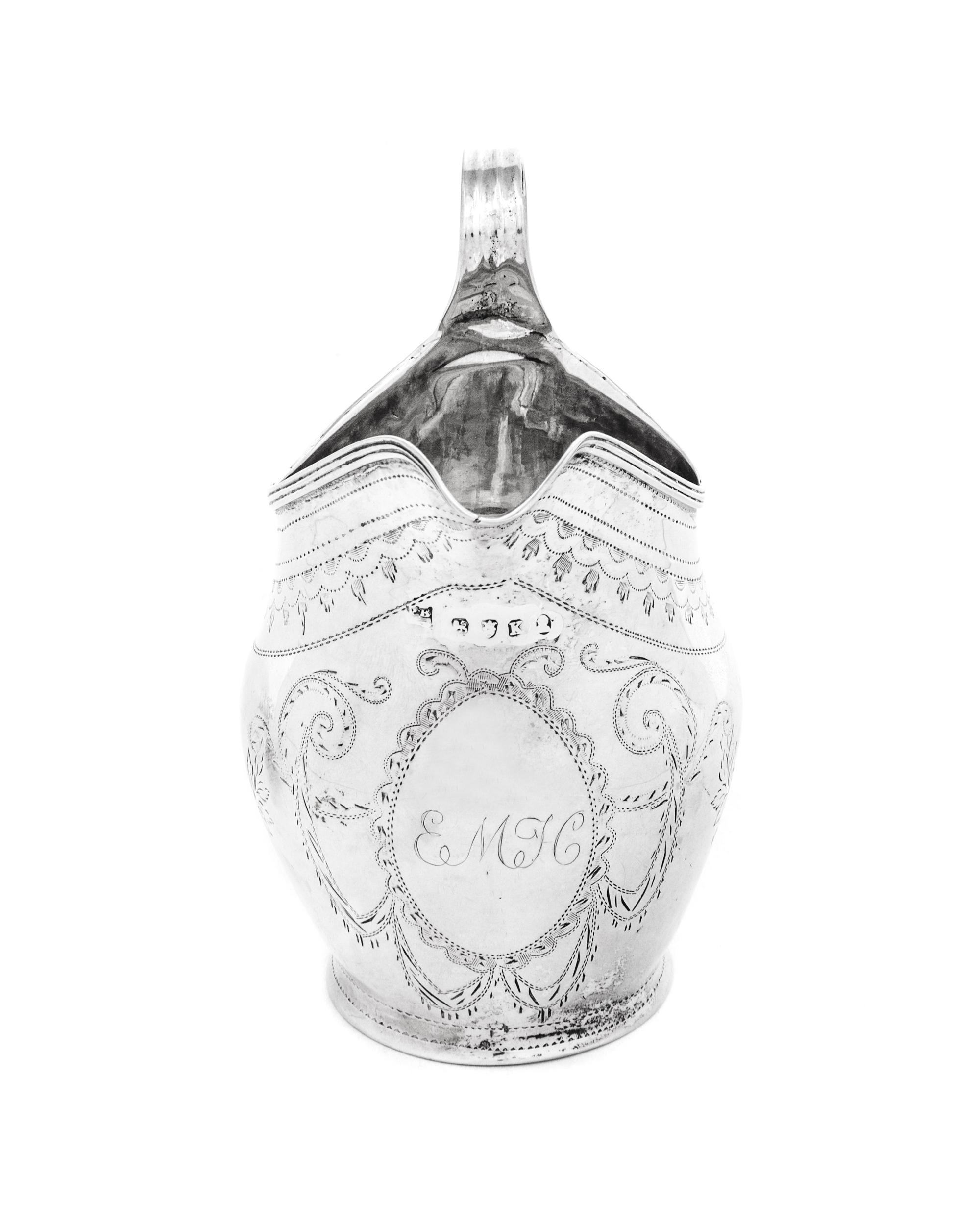 A George III Silver Creamer with Bright-Cut Decoration