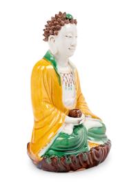 A Chinese Sancai Glazed Biscuit Figure of Buddha Shakyamuni