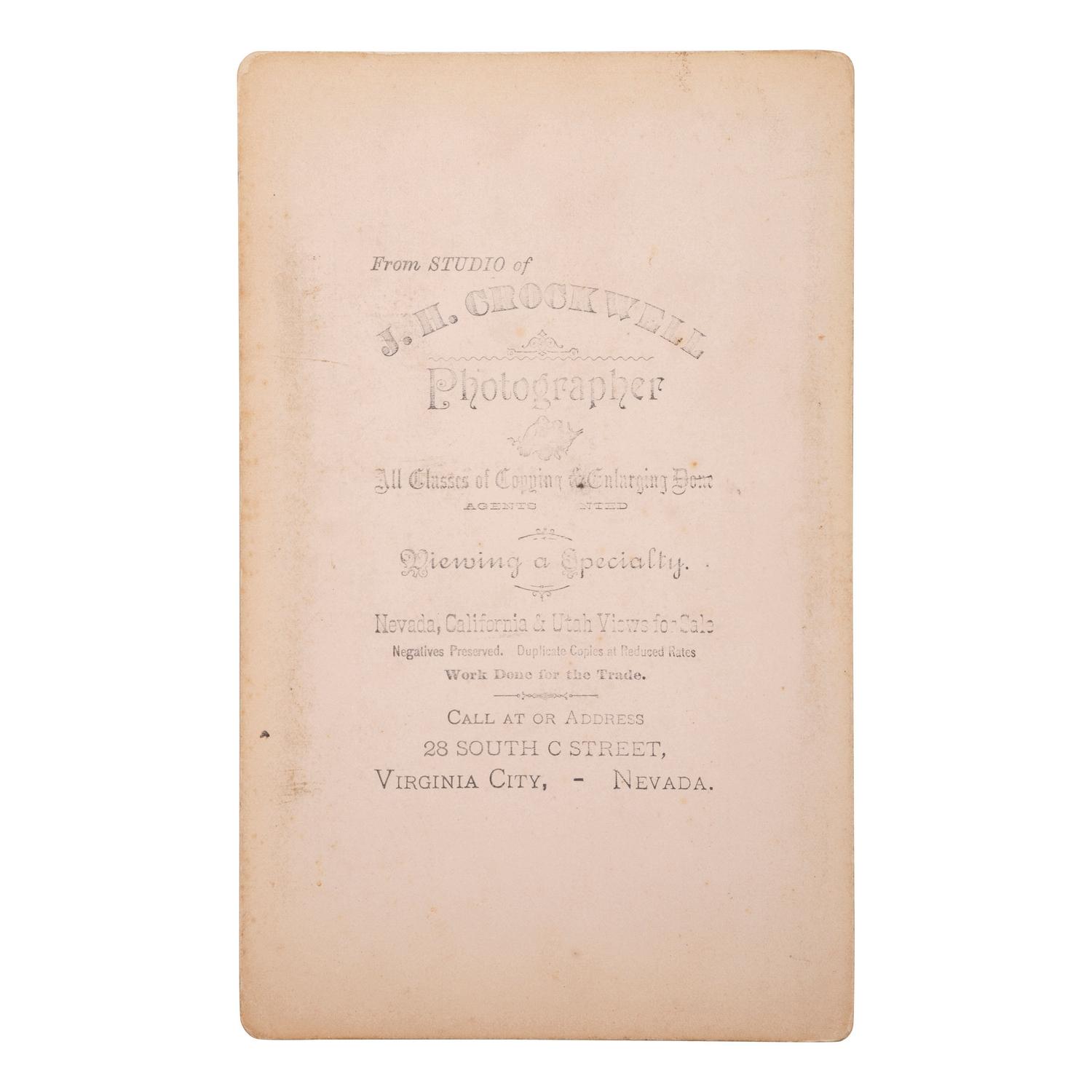 [MINING - NEVADA]. A group of 3 early mining images and a photograph booklet of mining activity in Virginia City, Goldfield, and Rawhide, Nevada, comprising: