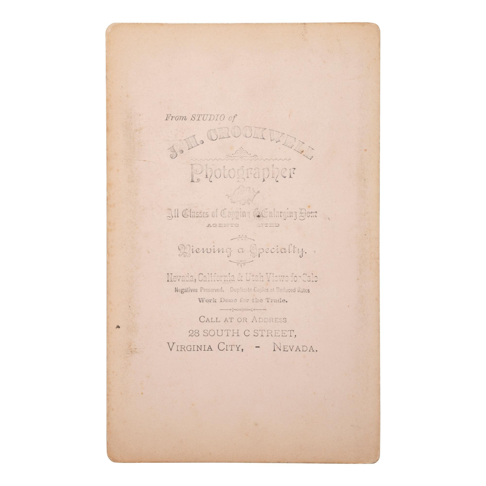 [MINING - NEVADA]. A group of 3 early mining images and a photograph booklet of mining activity in Virginia City, Goldfield, and Rawhide, Nevada, comprising: