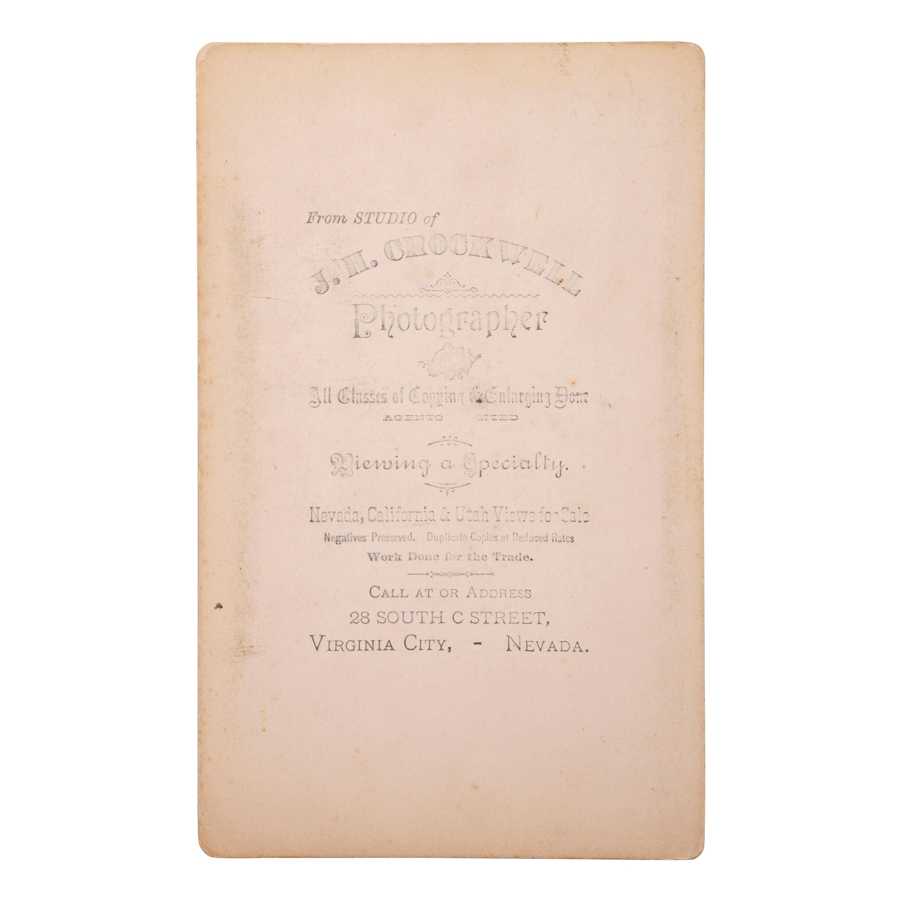 [MINING - NEVADA]. A group of 3 early mining images and a photograph booklet of mining activity in Virginia City, Goldfield, and Rawhide, Nevada, comprising: