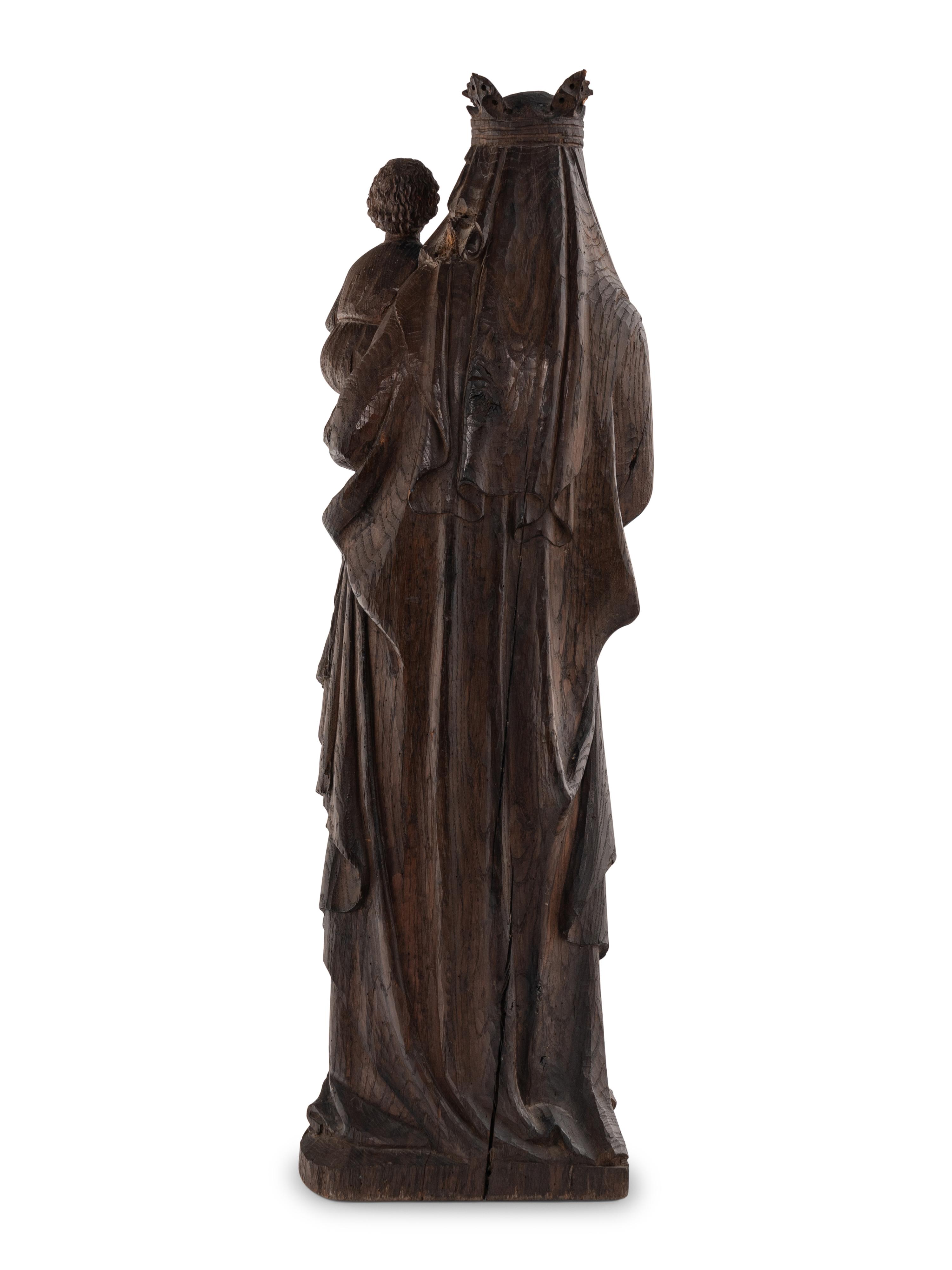 A Carved Oak Figural Group of the Madonna and Child