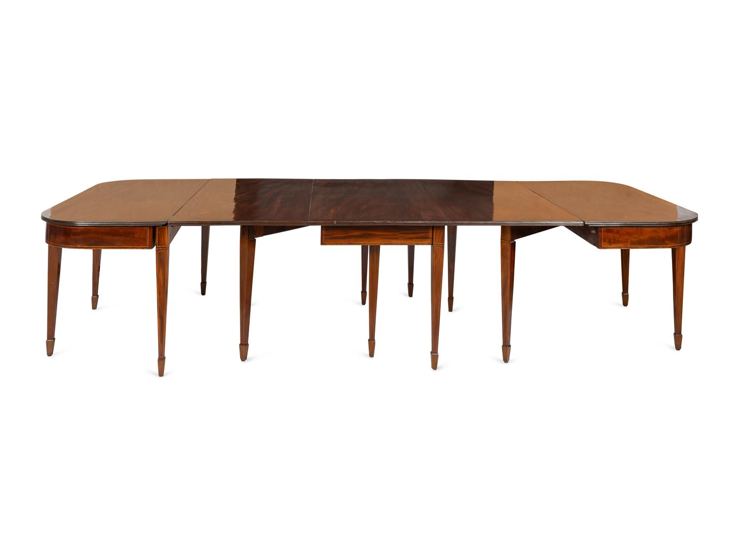A Large George III Inlaid Mahogany Extendable Dining Table