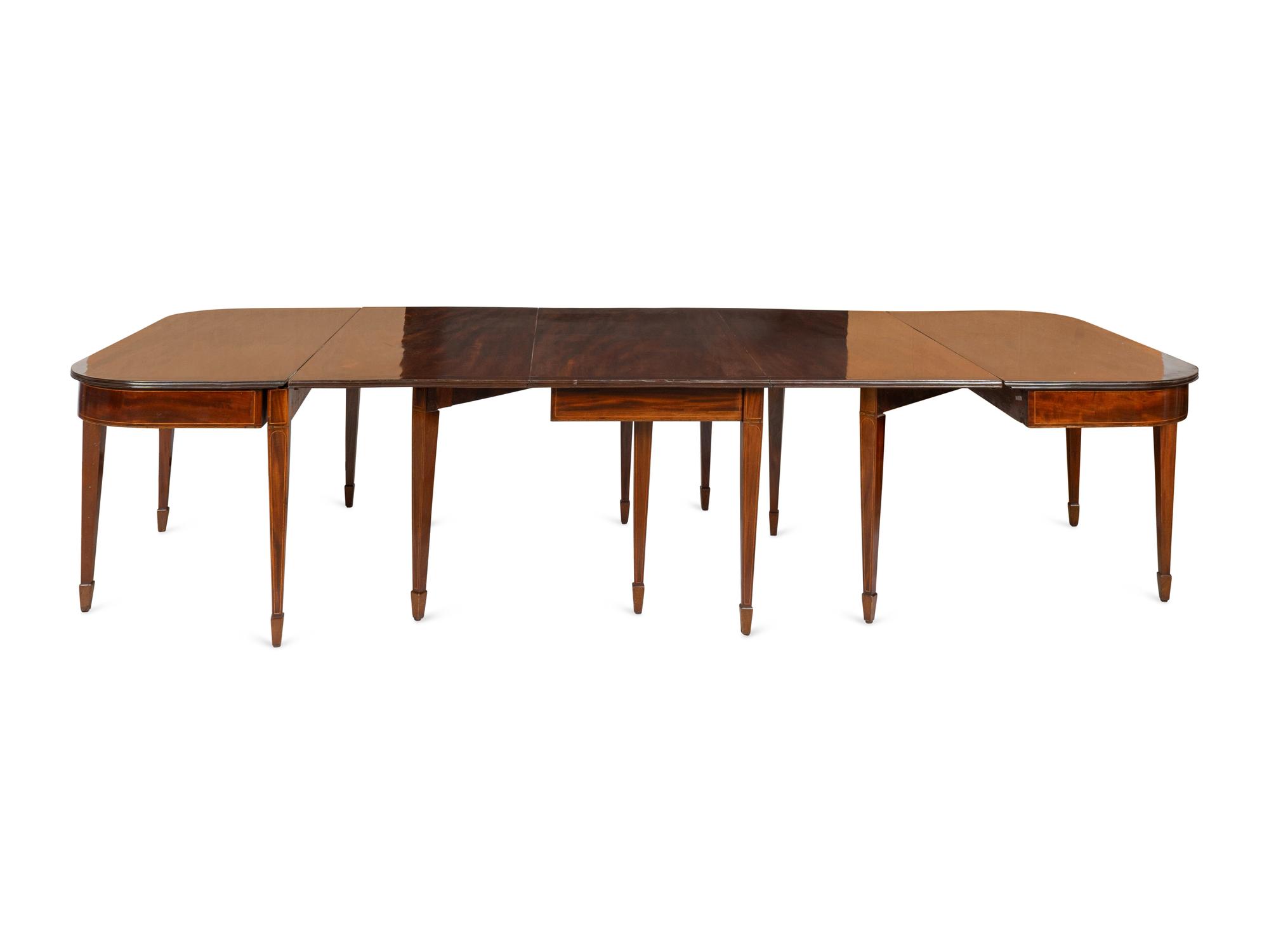 A Large George III Inlaid Mahogany Extendable Dining Table