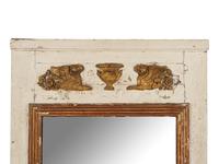 An Empire Style Painted and Parcel Gilt Mirror