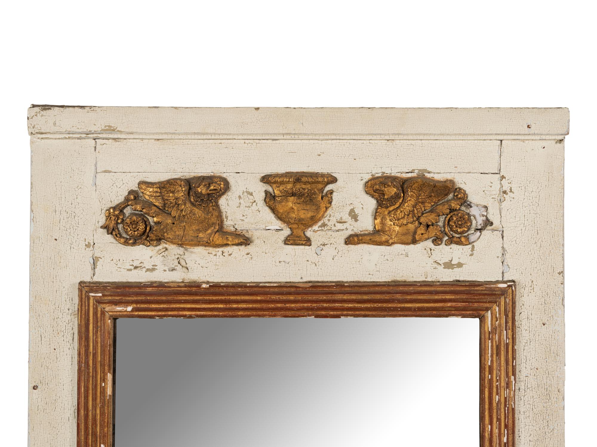 An Empire Style Painted and Parcel Gilt Mirror