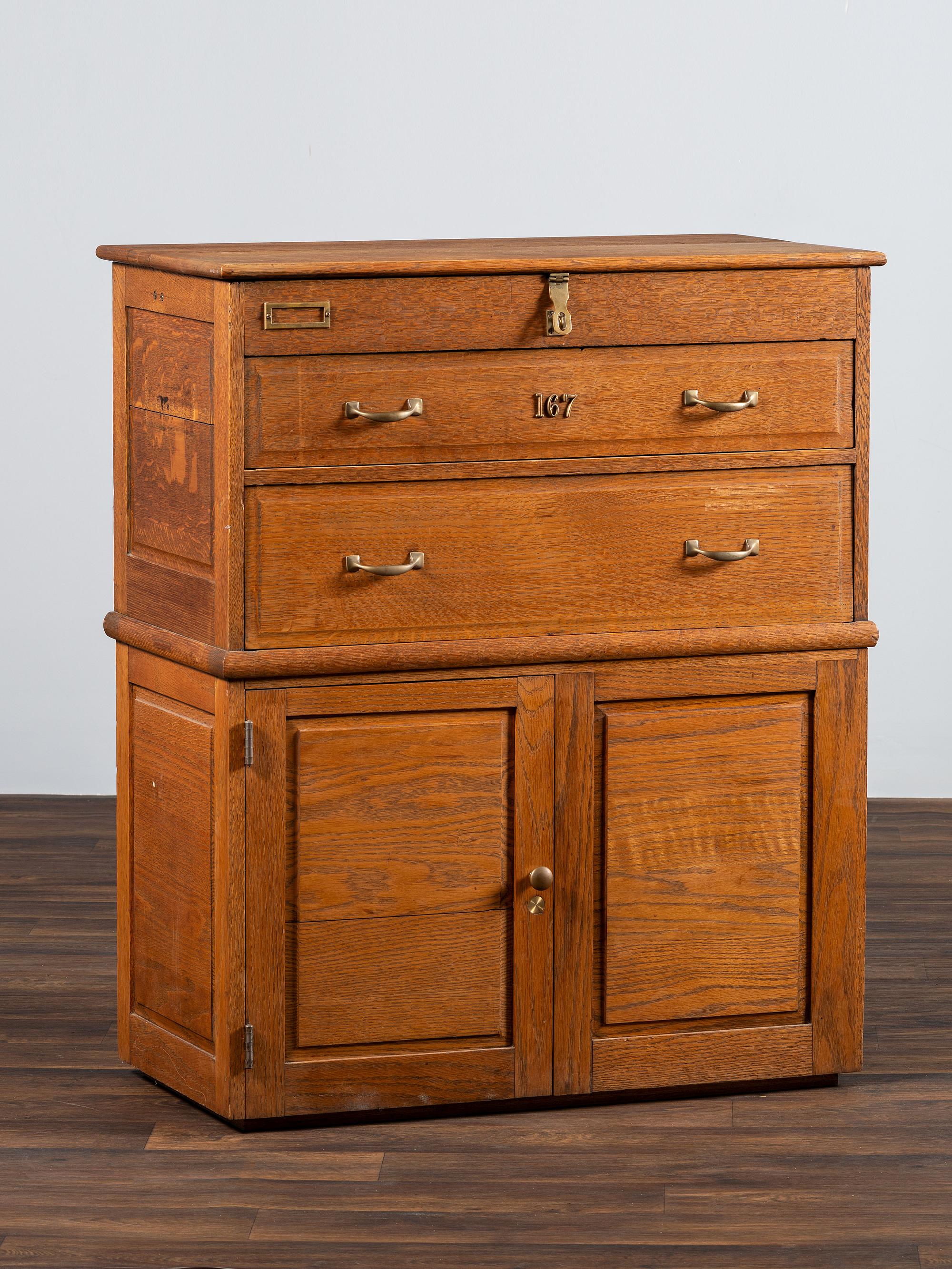 A Dental Student's Brass Mounted Oak Lift Top Cabinet