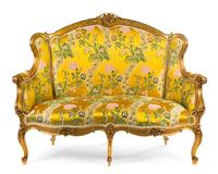 A Louis XV Style Giltwood Canape a Oreilles Height 47 x width 55 x depth 27 inches. — 19TH CENTURY