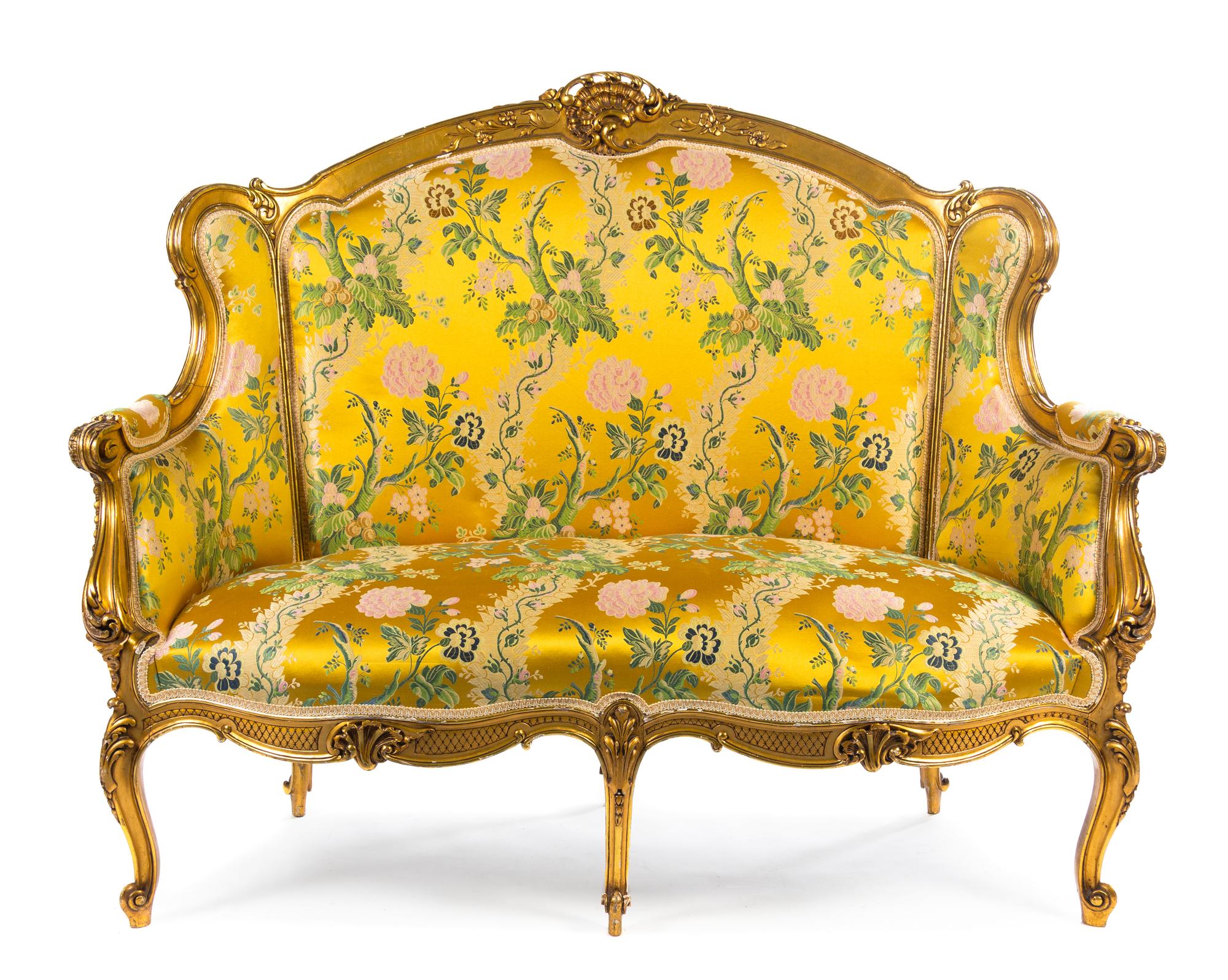 A Louis XV Style Giltwood Canape a Oreilles Height 47 x width 55 x depth 27 inches. — 19TH CENTURY
