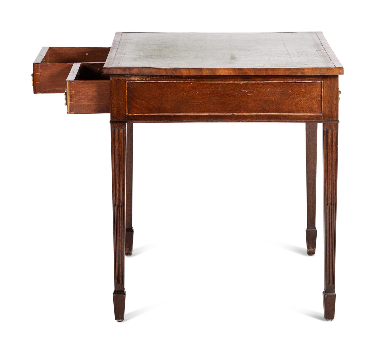 An English Mahogany Leather Inset Writing Table