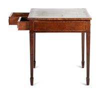 An English Mahogany Leather Inset Writing Table