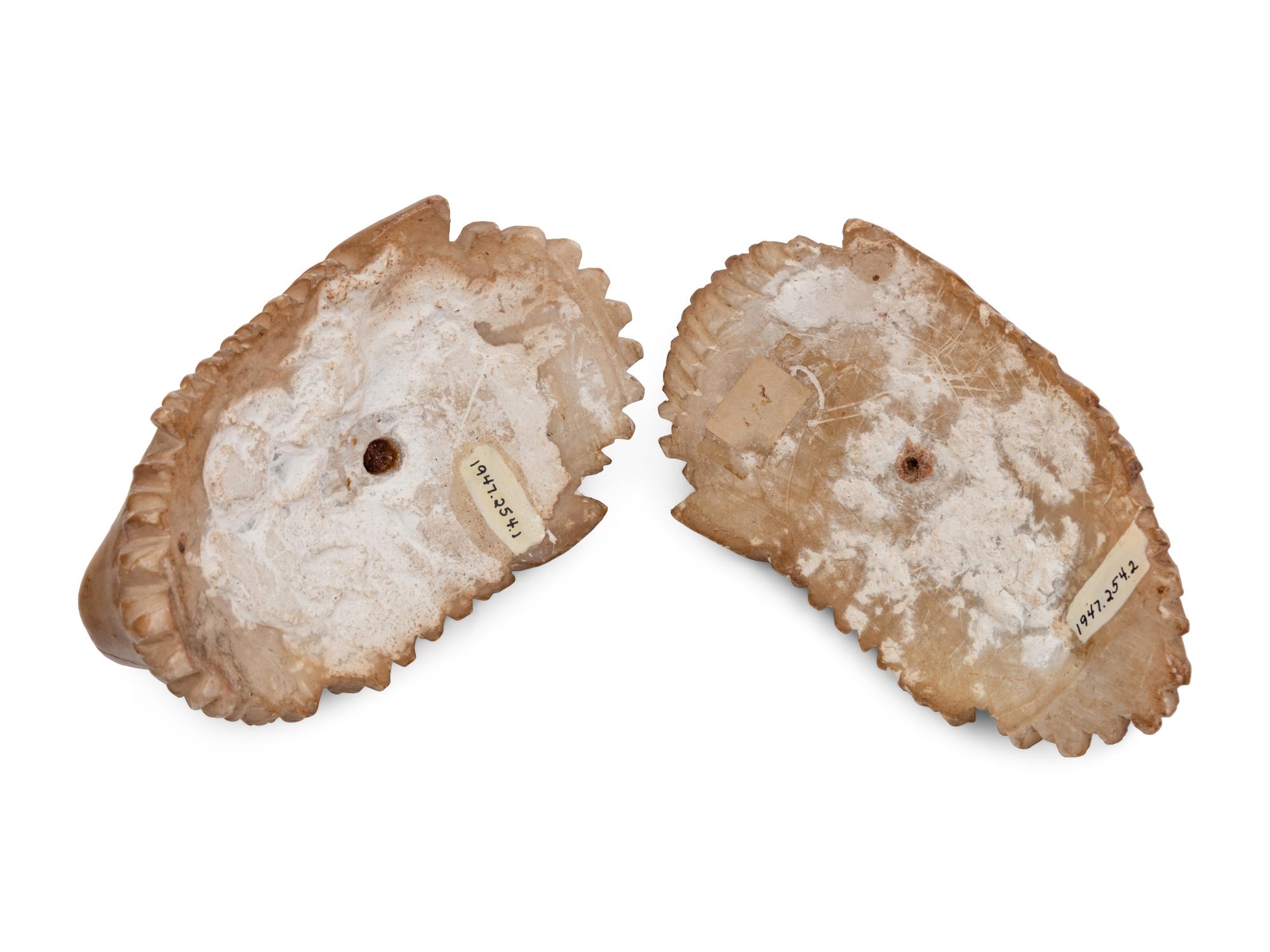 Two Continental Carved Alabaster Masks