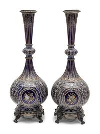 A Pair of Continental Gilt and Enameled Cobalt Glazed Porcelain Vases