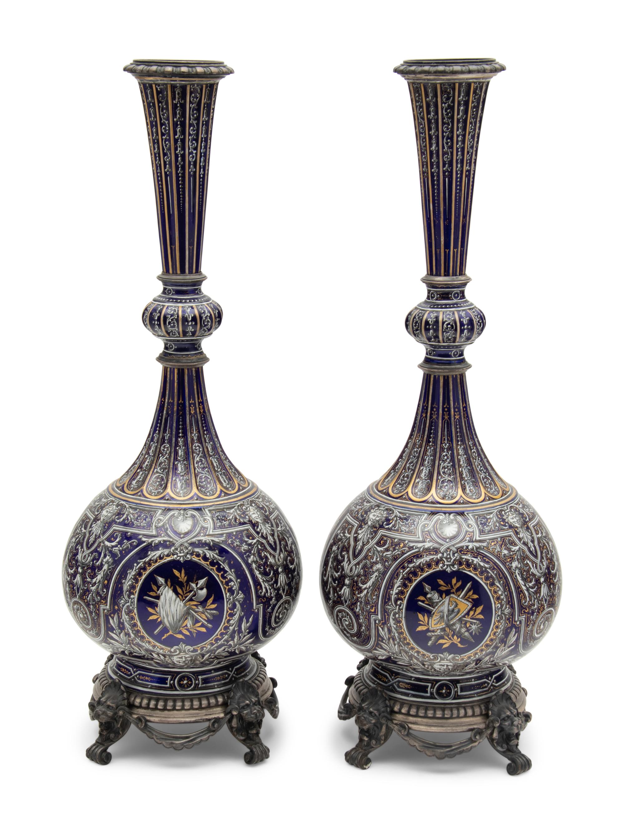 A Pair of Continental Gilt and Enameled Cobalt Glazed Porcelain Vases