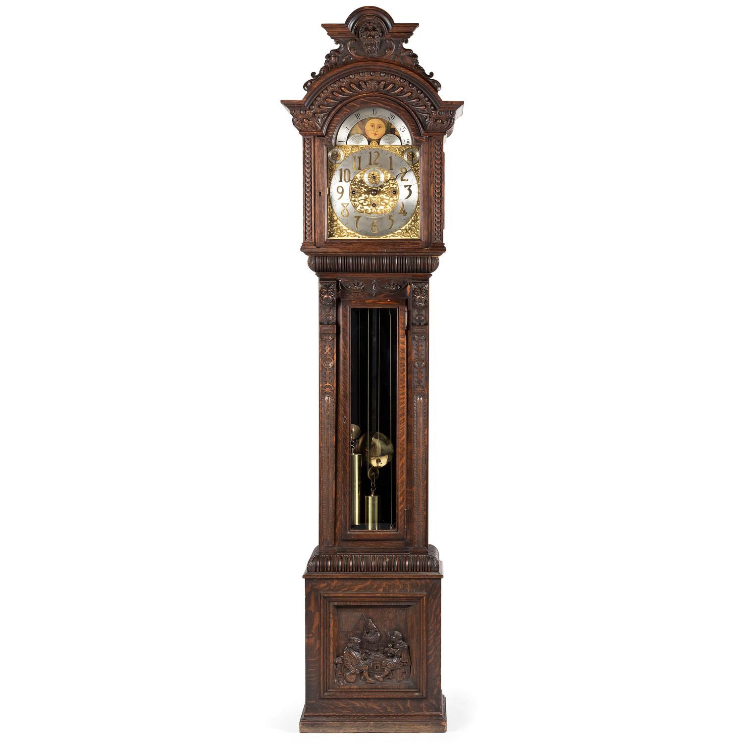 A Renaissance Revival Carved Oak Tall Case Clock