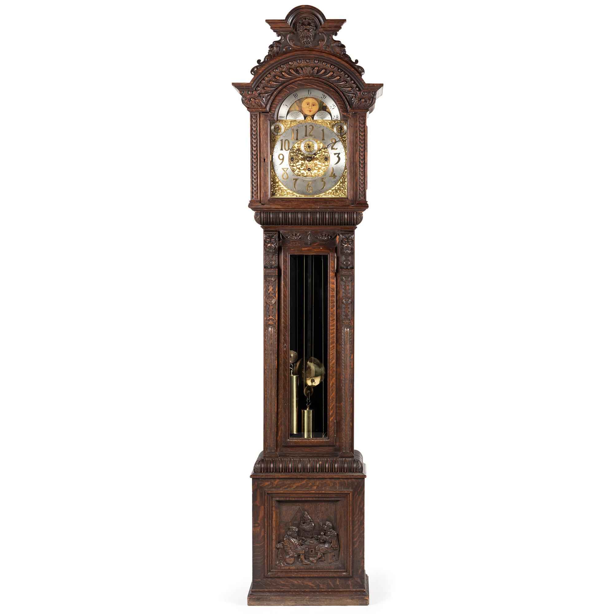 A Renaissance Revival Carved Oak Tall Case Clock