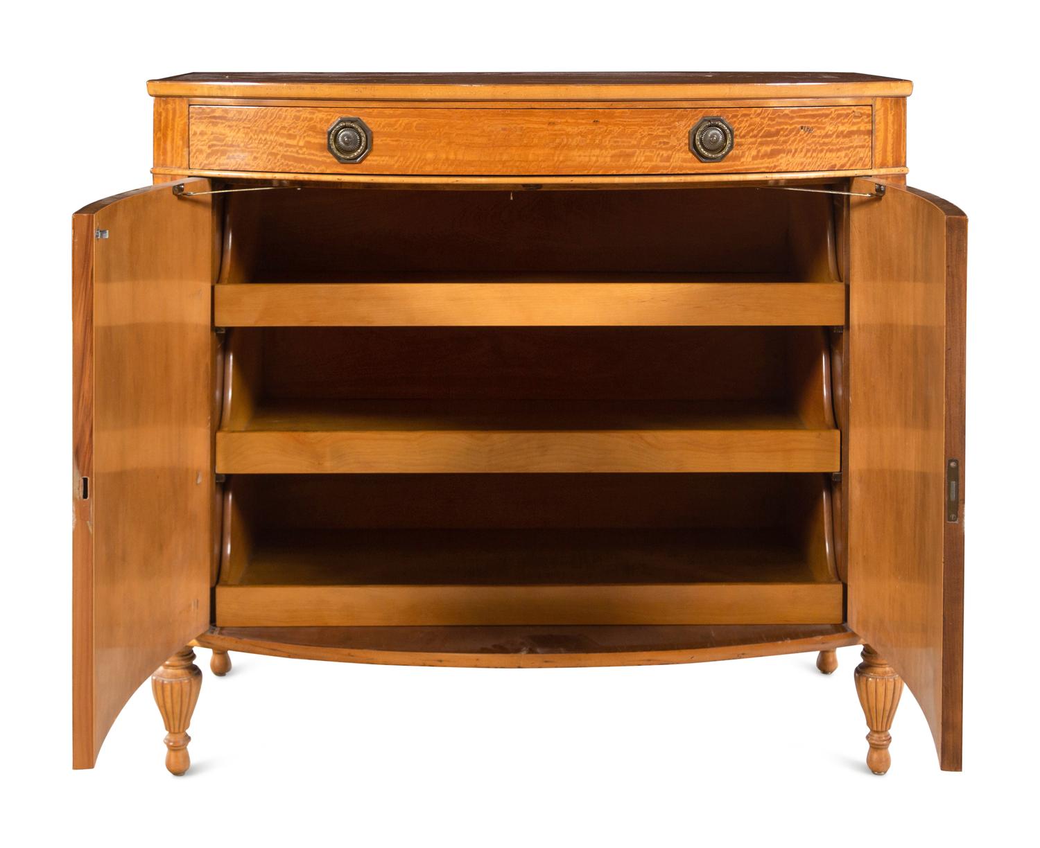 An Edwardian Painted Satinwood Bowfront Cabinet