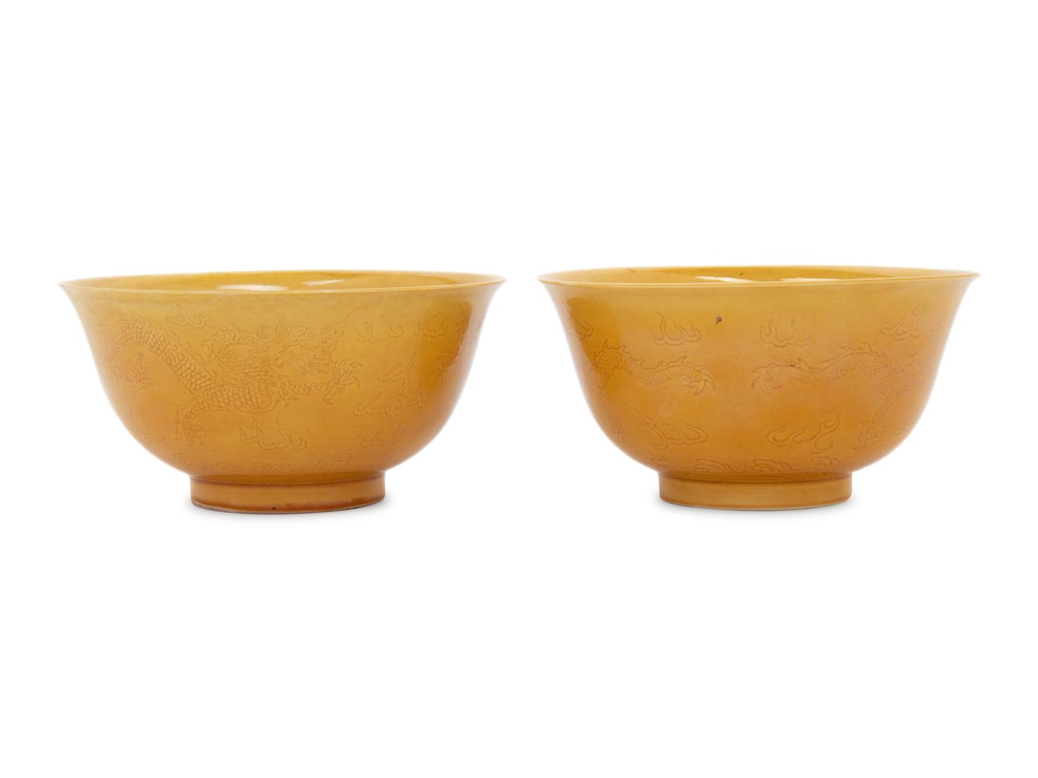 A Pair of Incised Yellow Glazed Porcelain 'Dragon' Bowls