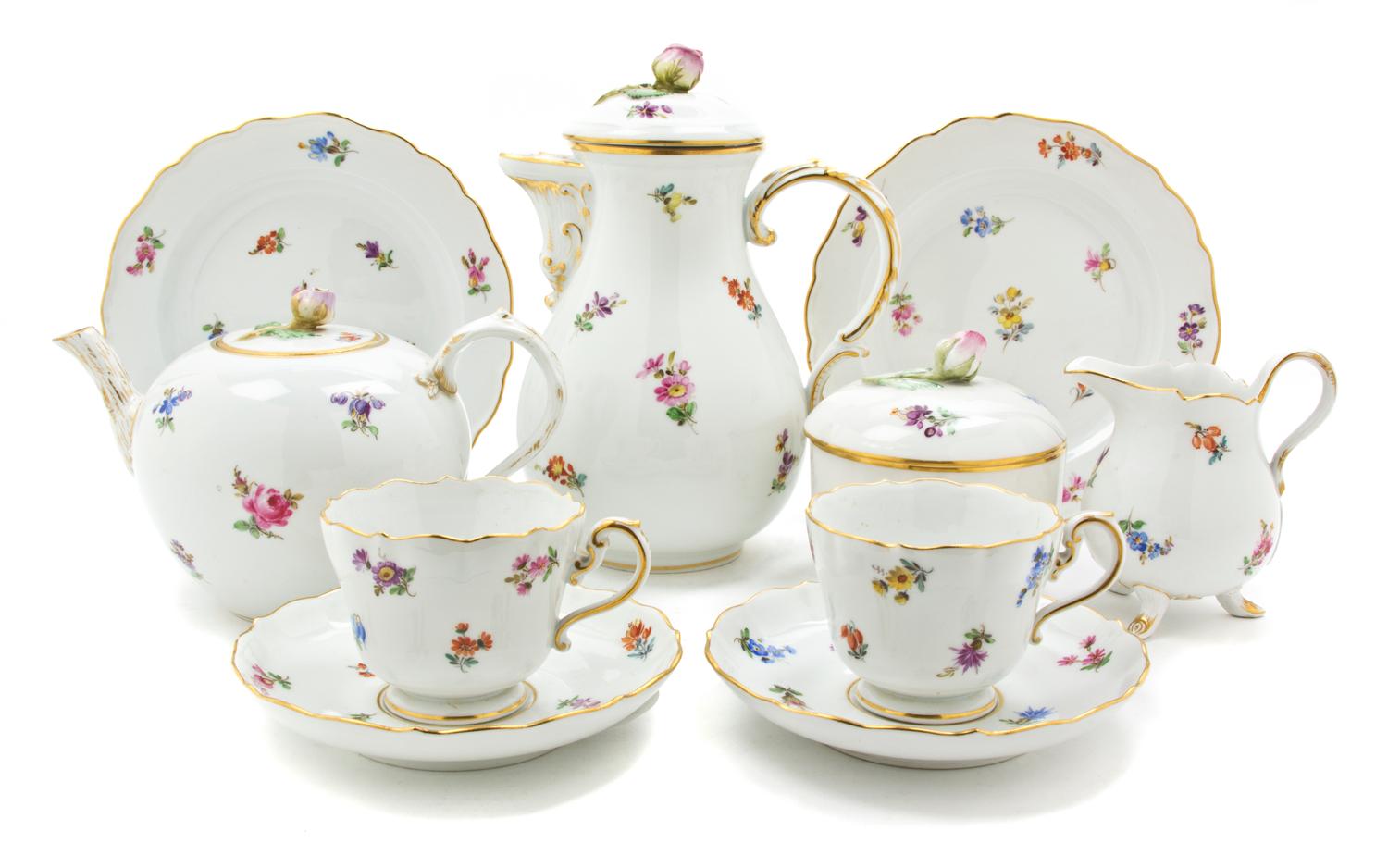 A Meissen Porcelain Tete-a-Tete, Height of coffee pot 8 1/4 inches.