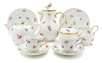 A Meissen Porcelain Tete-a-Tete, Height of coffee pot 8 1/4 inches.
