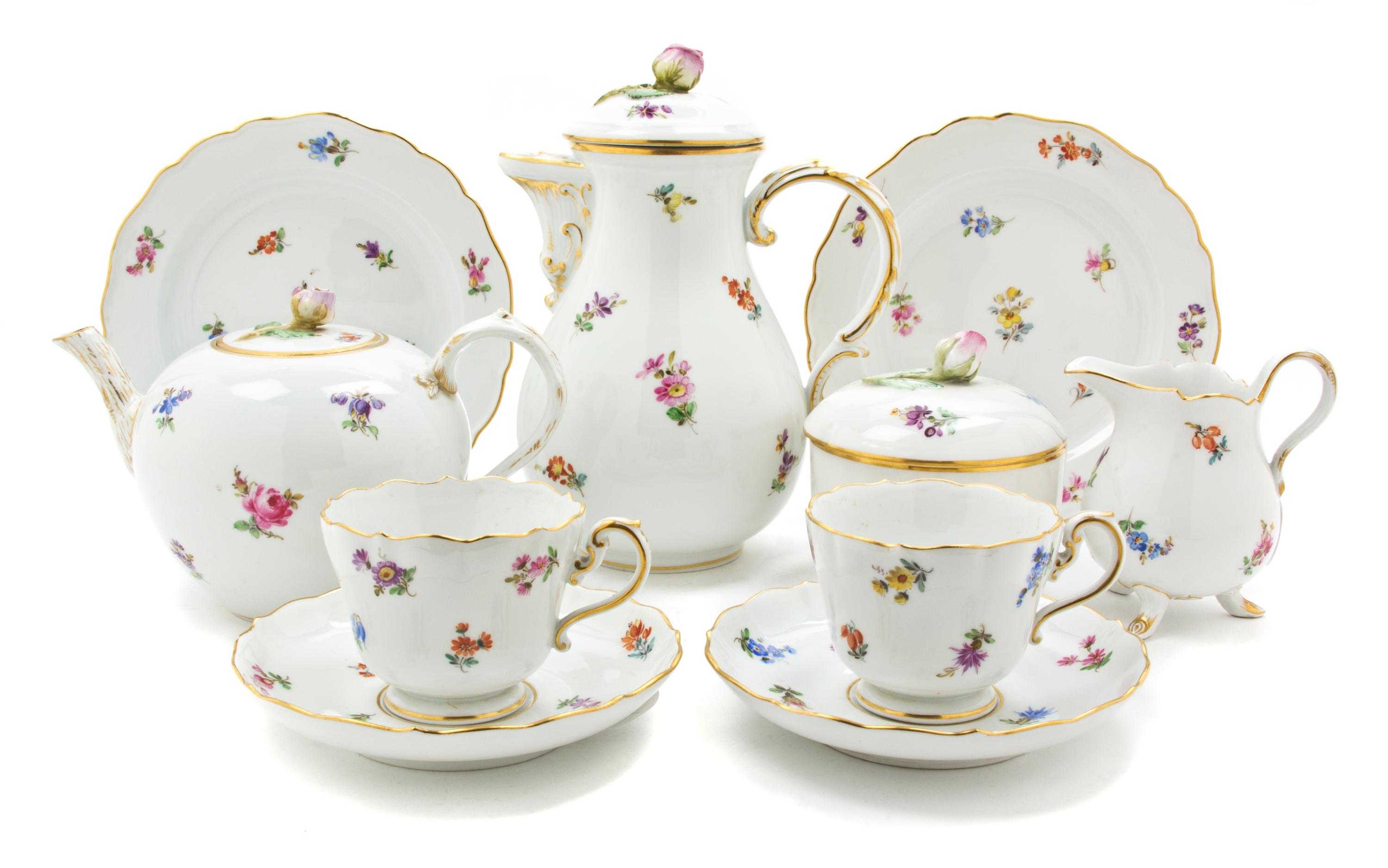 A Meissen Porcelain Tete-a-Tete, Height of coffee pot 8 1/4 inches.