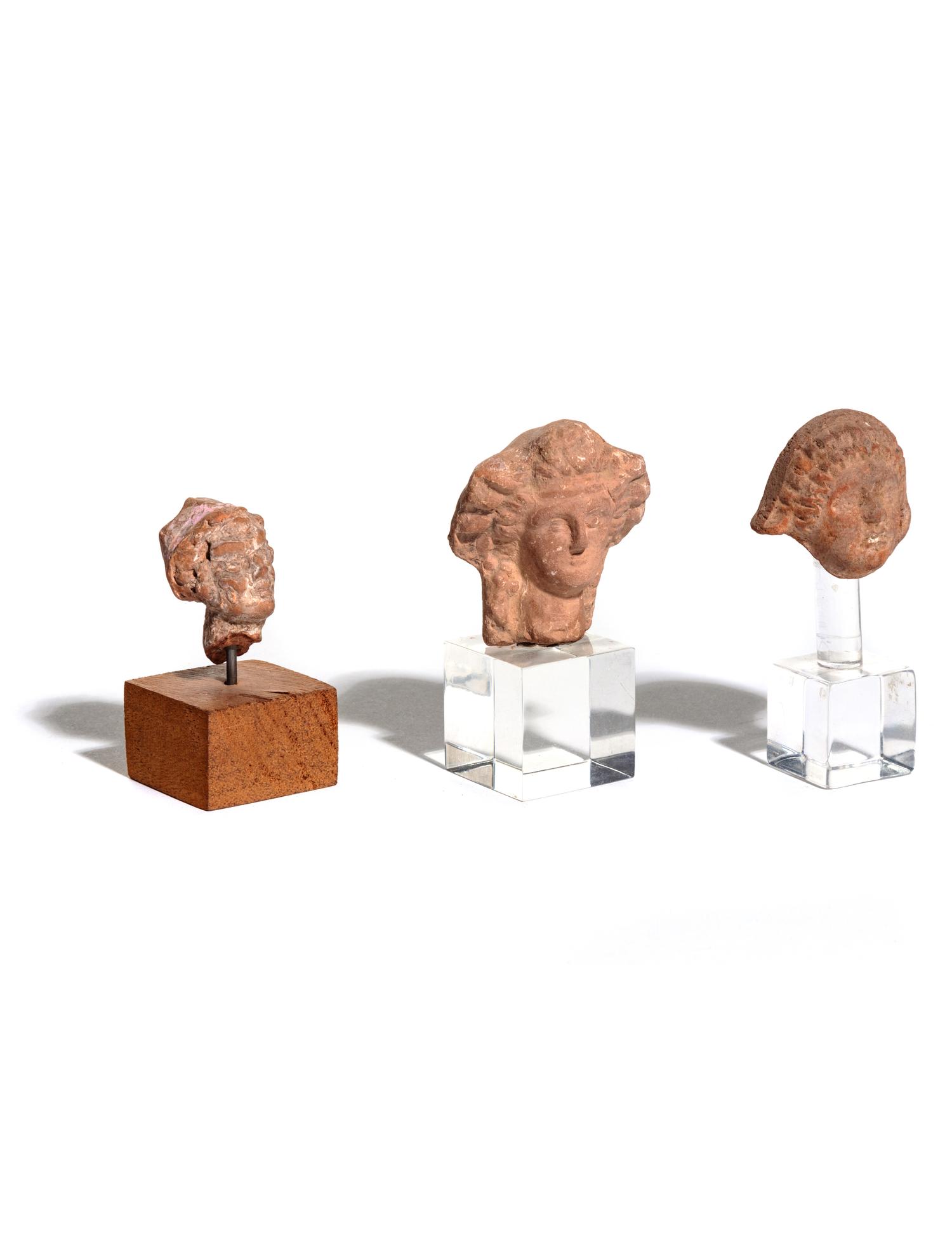 Three Graeco-Roman Terra Cotta Heads