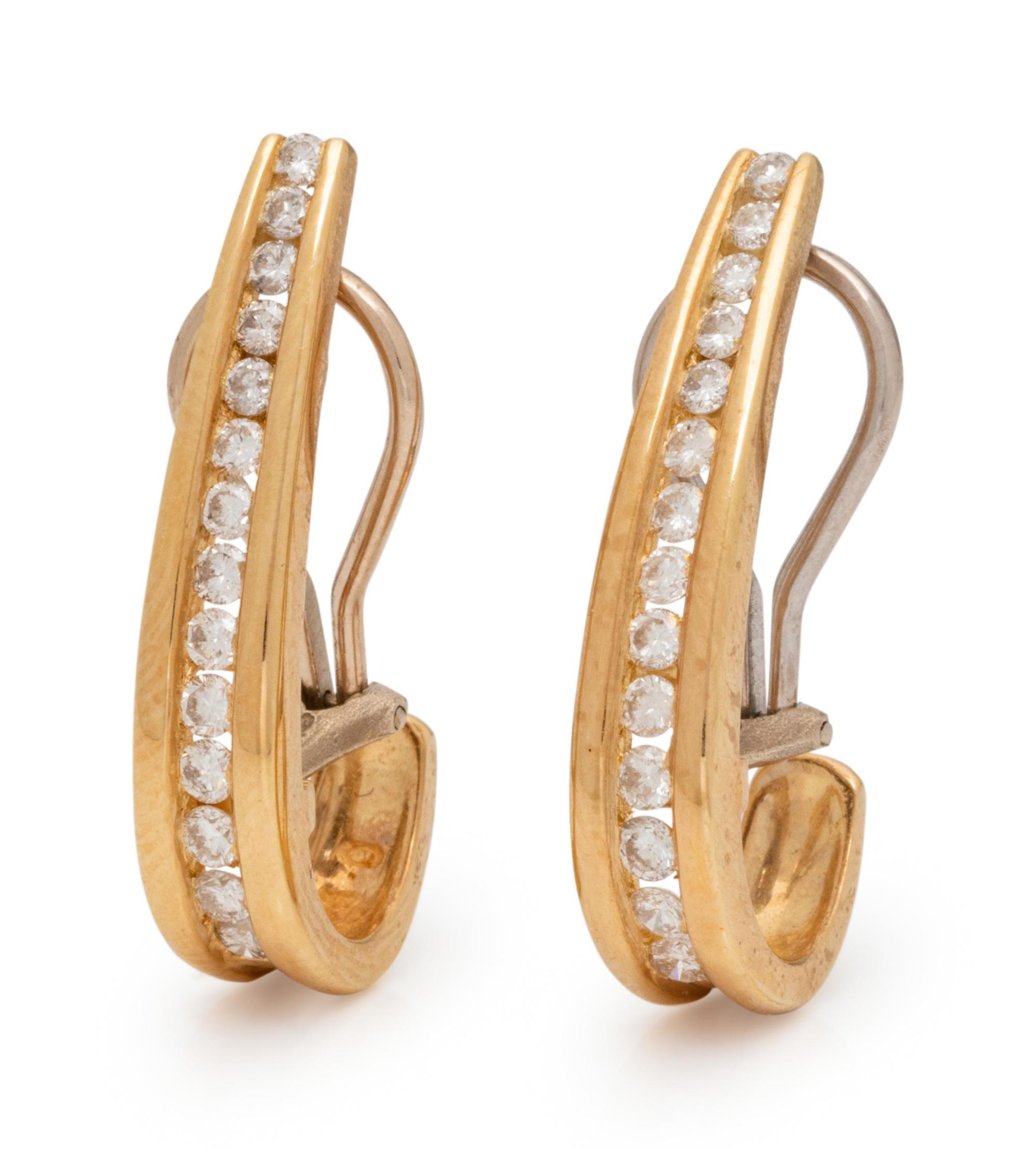 A Pair of 14 Karat Yellow Gold and Diamond Earclips,