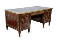 A Louis XVI Style Gilt Bronze Mounted Mahogany Desk — EARLY 20TH CENTURY