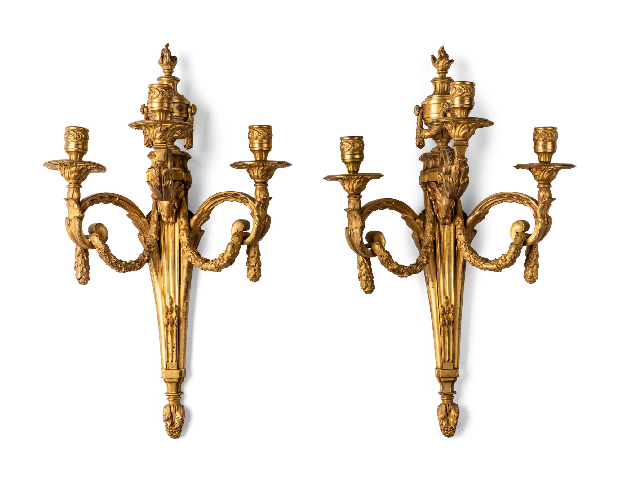 A Pair of Louis XVI Style Gilt Bronze Three-Light Sconces