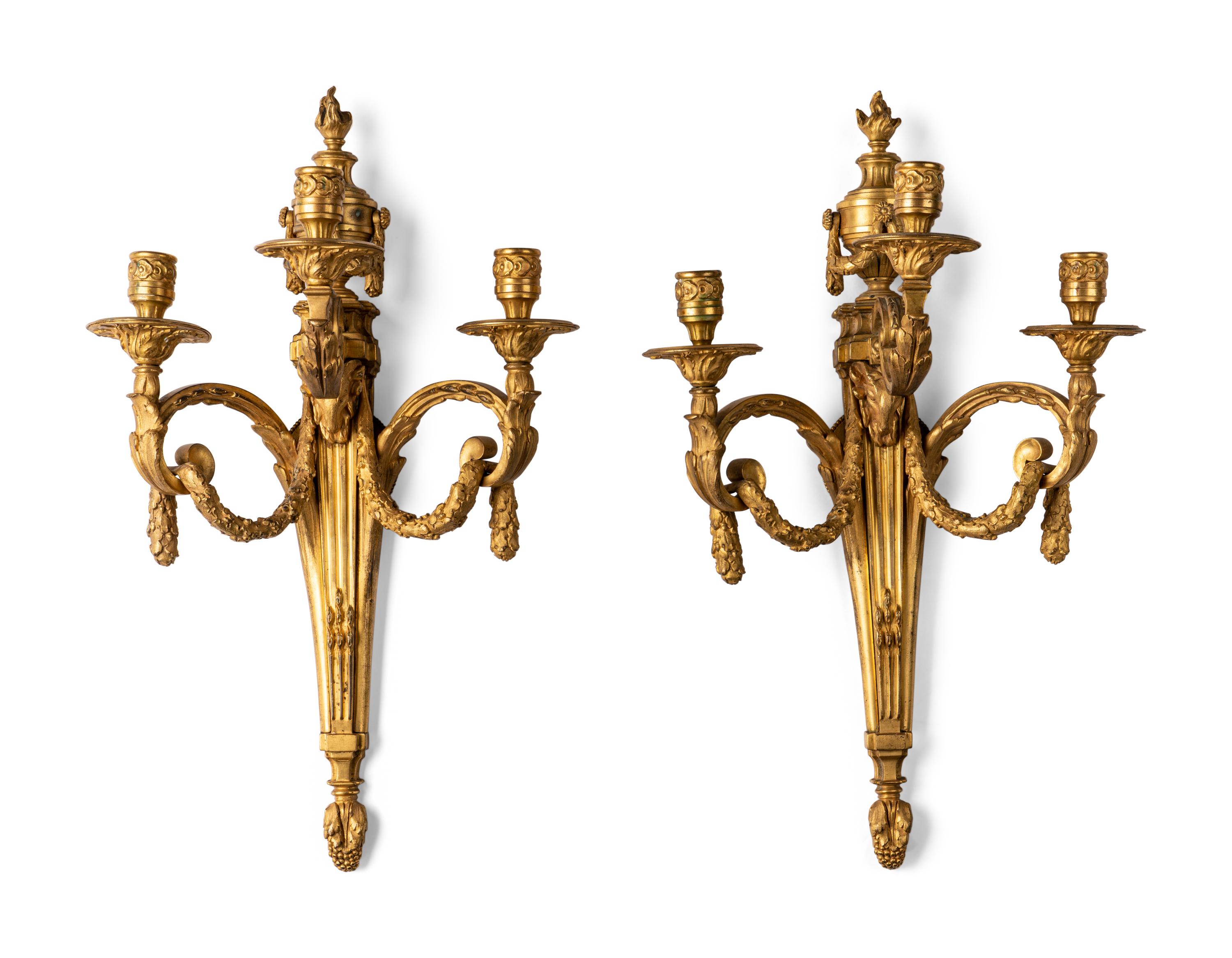 A Pair of Louis XVI Style Gilt Bronze Three-Light Sconces