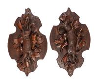 A Pair of Large Black Forest Carved Walnut Game Plaques