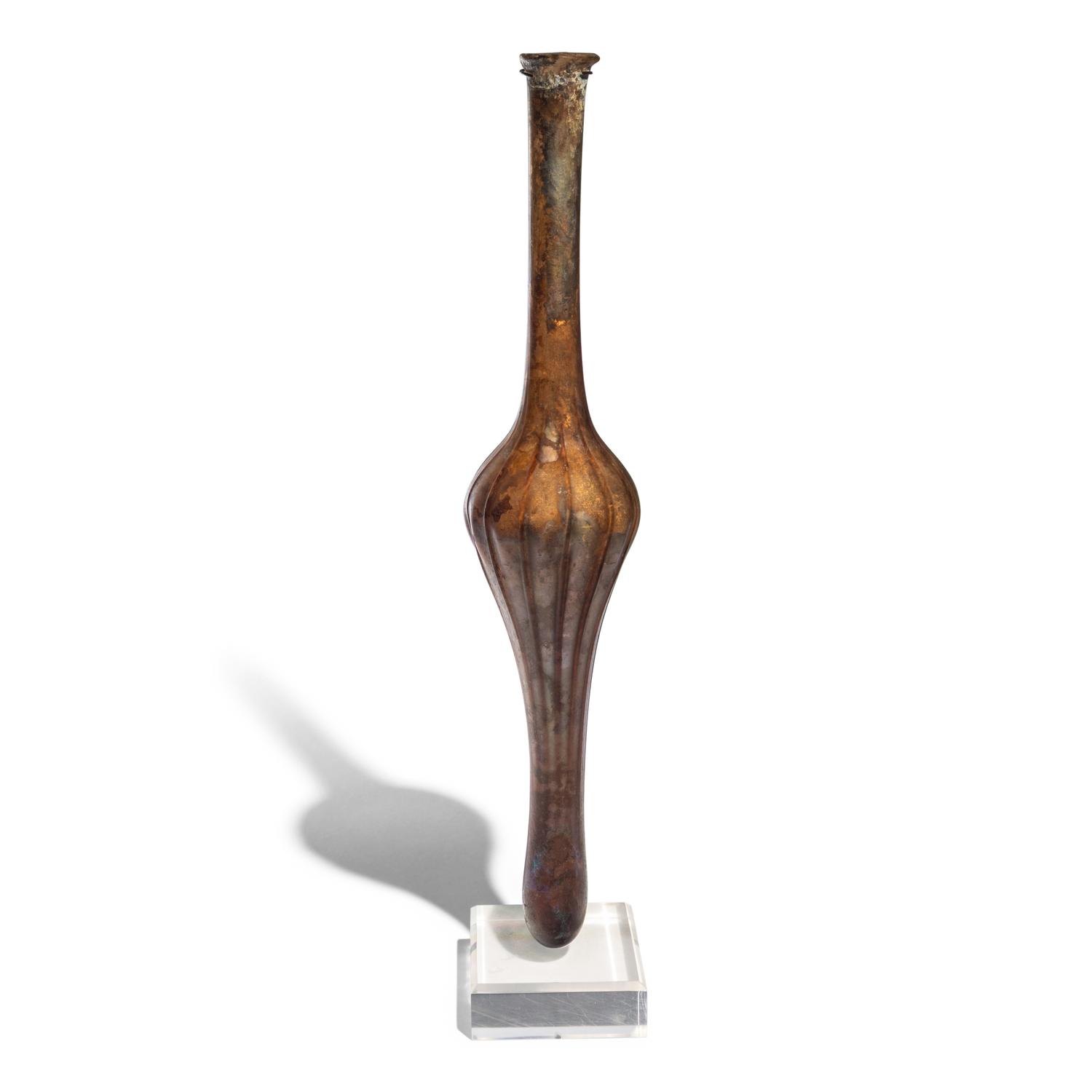 A Roman Aubergine Glass Unguentarium