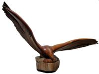 Large carved wood figure of an eagle leo moore, 20th century
