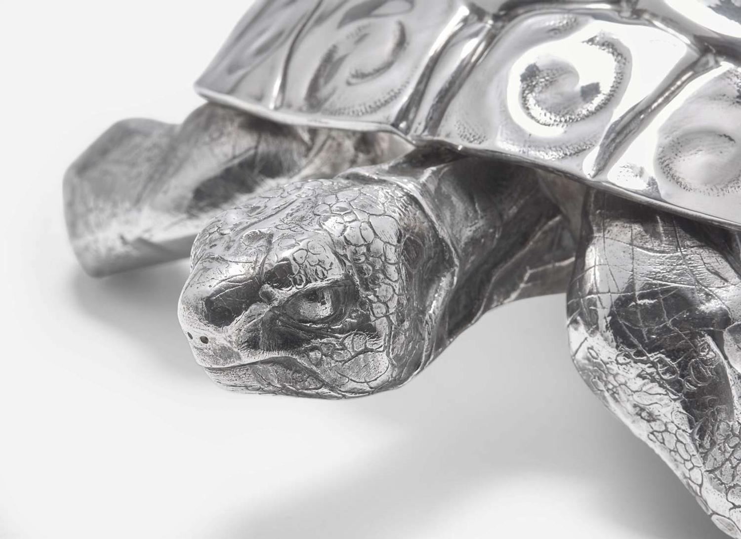 A sterling silver tortoise sculpture together with a silverplated crab, 20th century