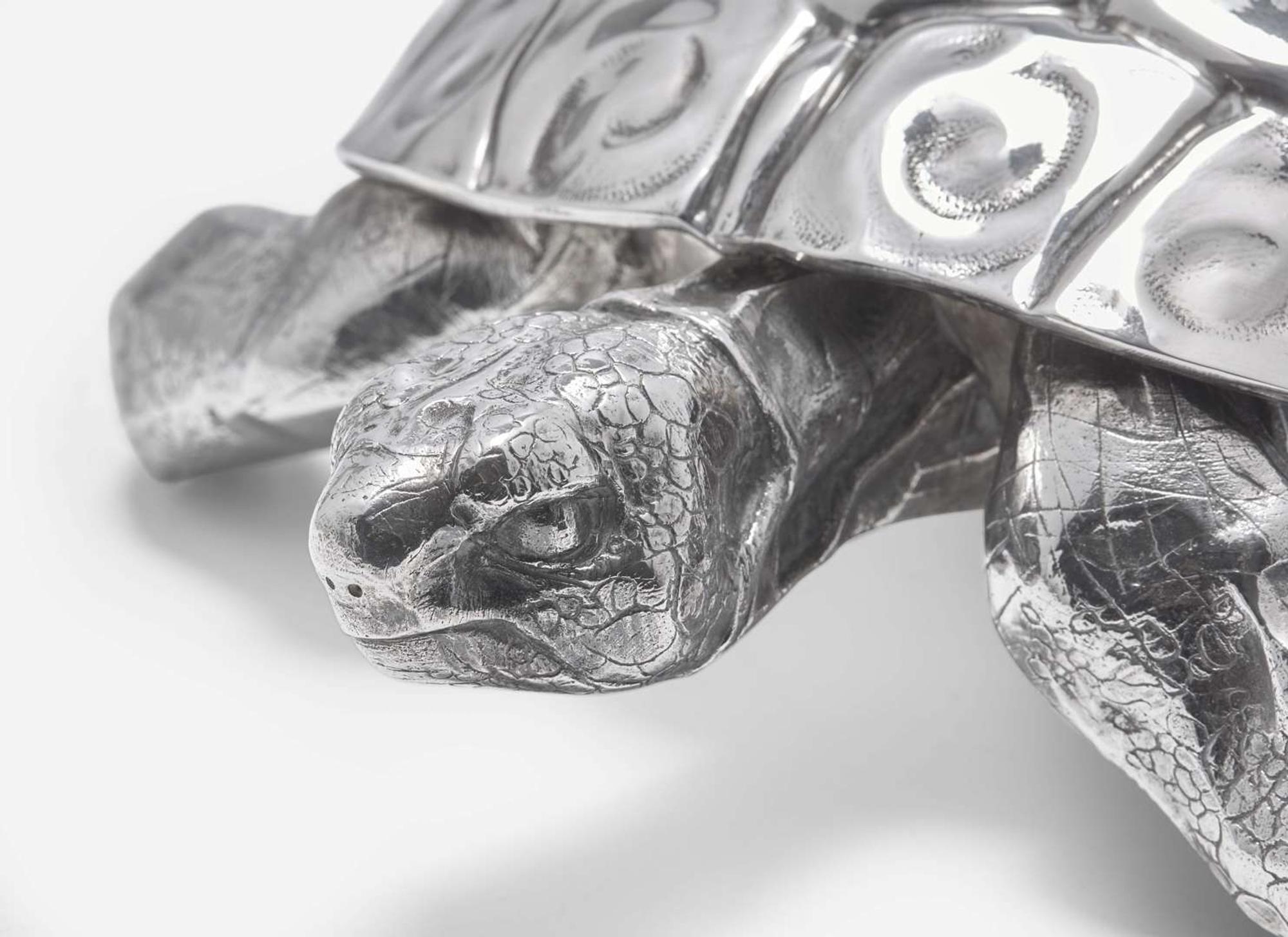 A sterling silver tortoise sculpture together with a silverplated crab, 20th century