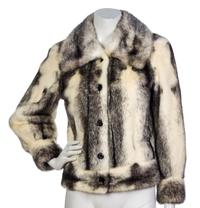 A Chombart Ivory and Brown Cropped Fur Coat,