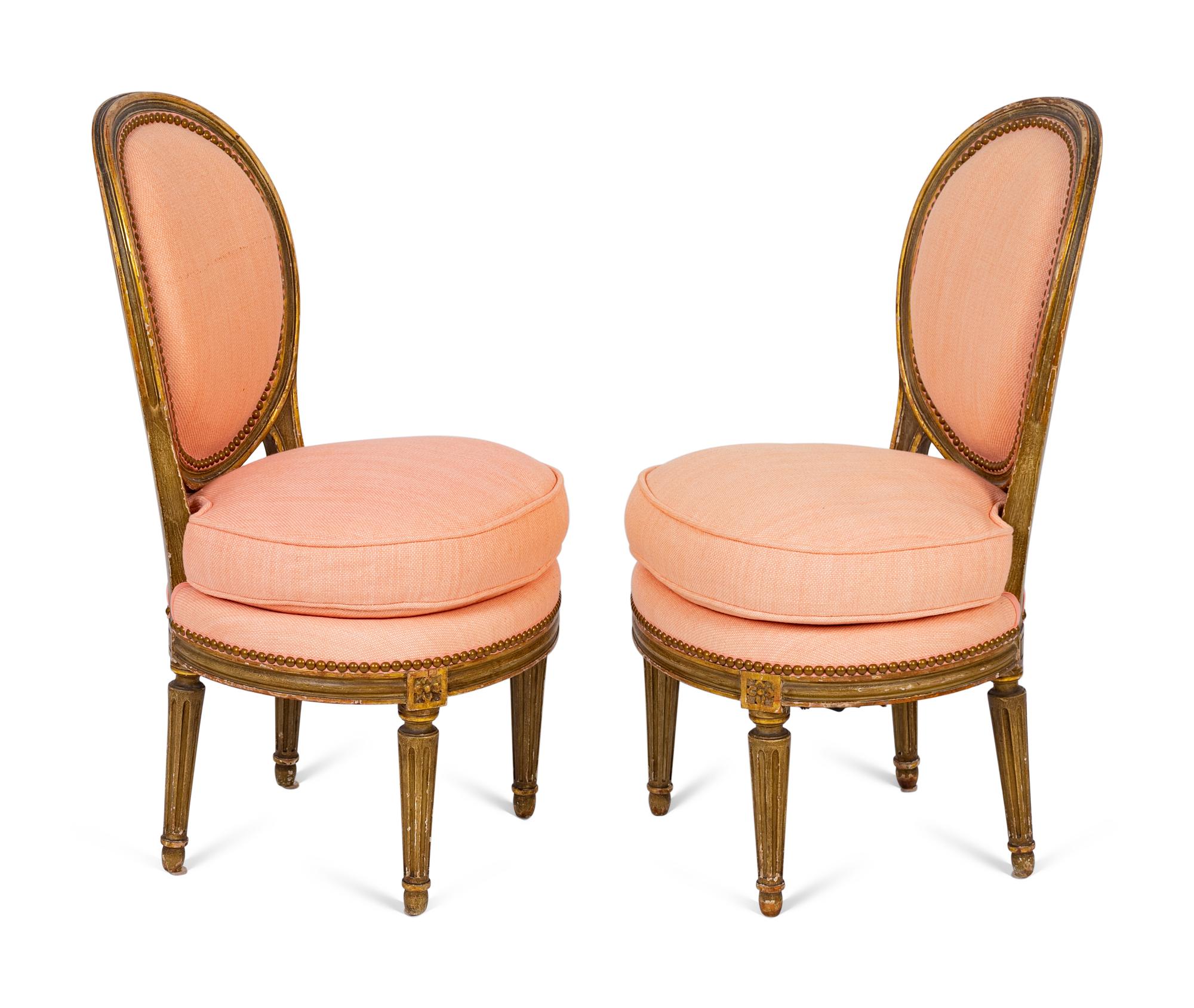 A Pair of Louis XVI Parcel-Gilt Petite Boudoir Chairs — 19TH CENTURY
