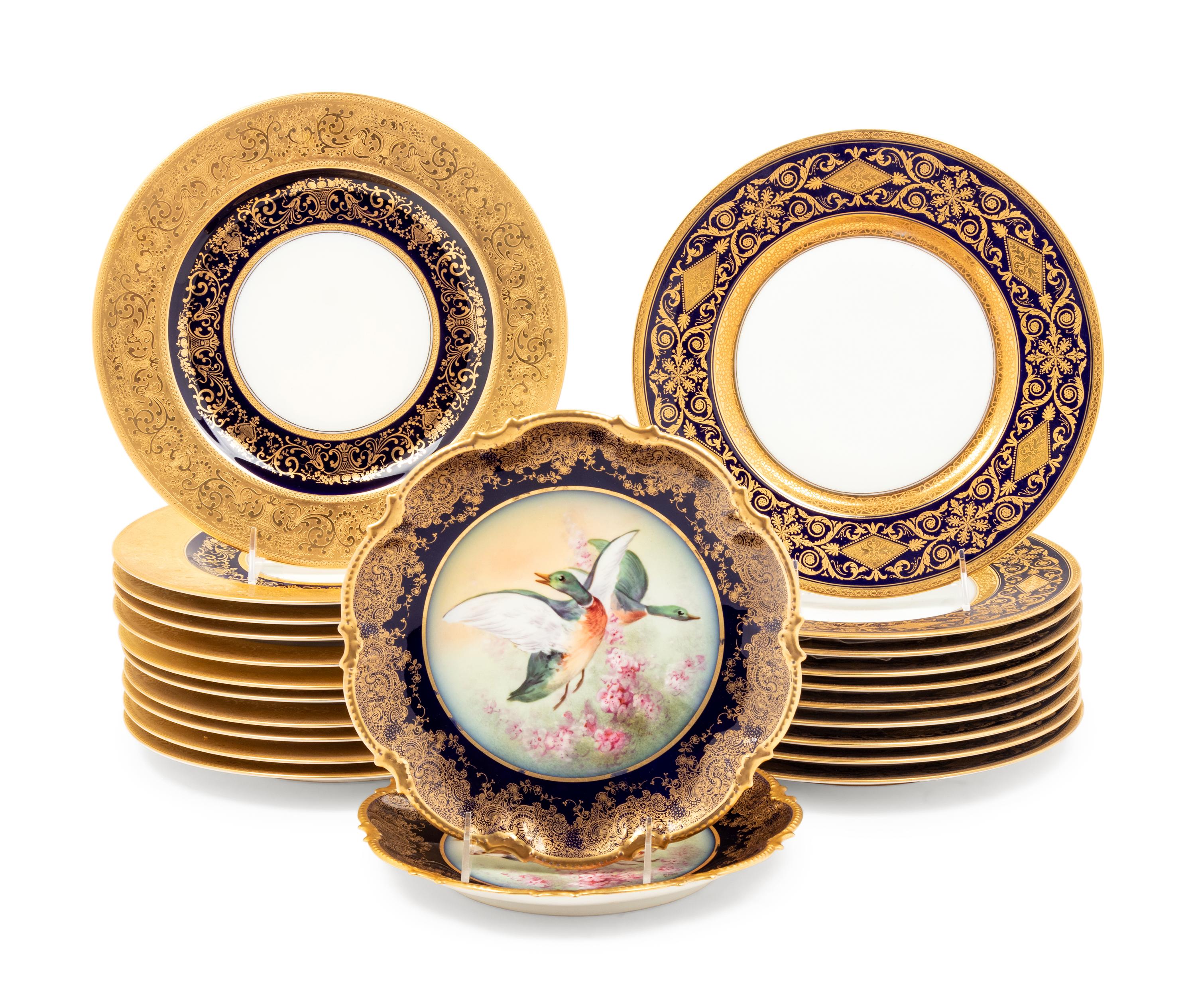 A Collection of Gilt and Cobalt Decorated Porcelain Plates
