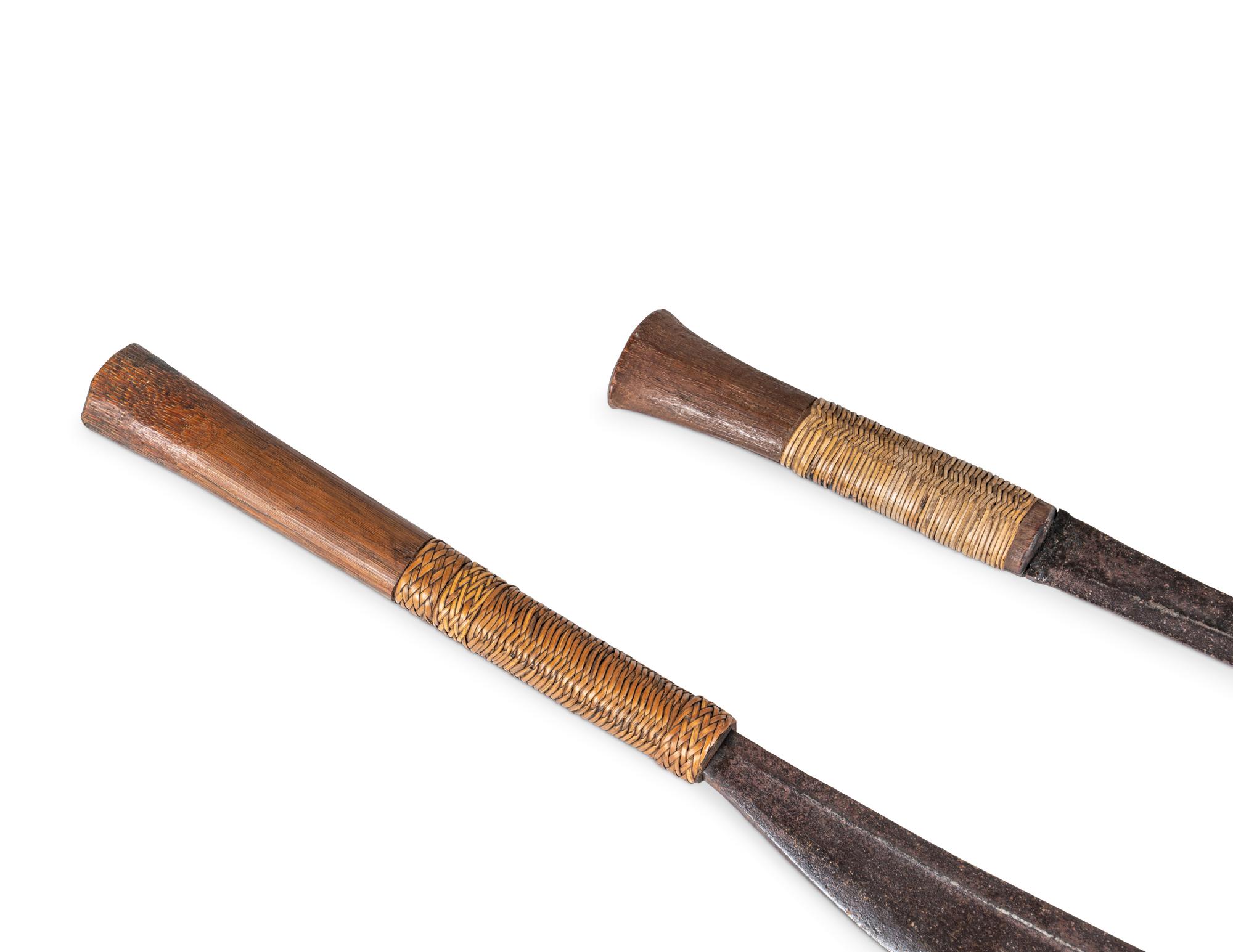 Two Naga Hill Tribe Dao Swords and Two Garter Belts