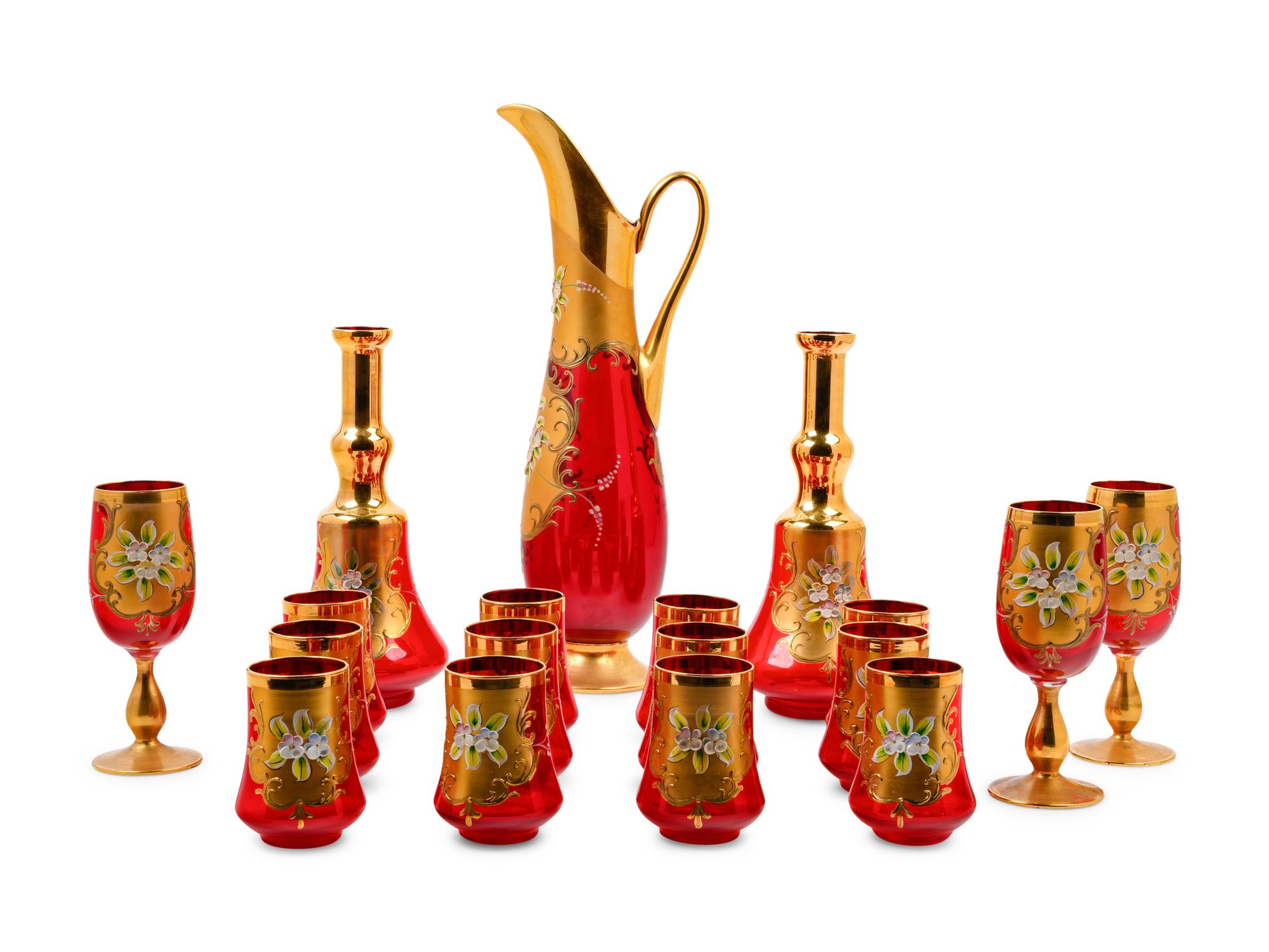 A Murano Gilt and Enamel Decorated Colored Glass Stemware Service