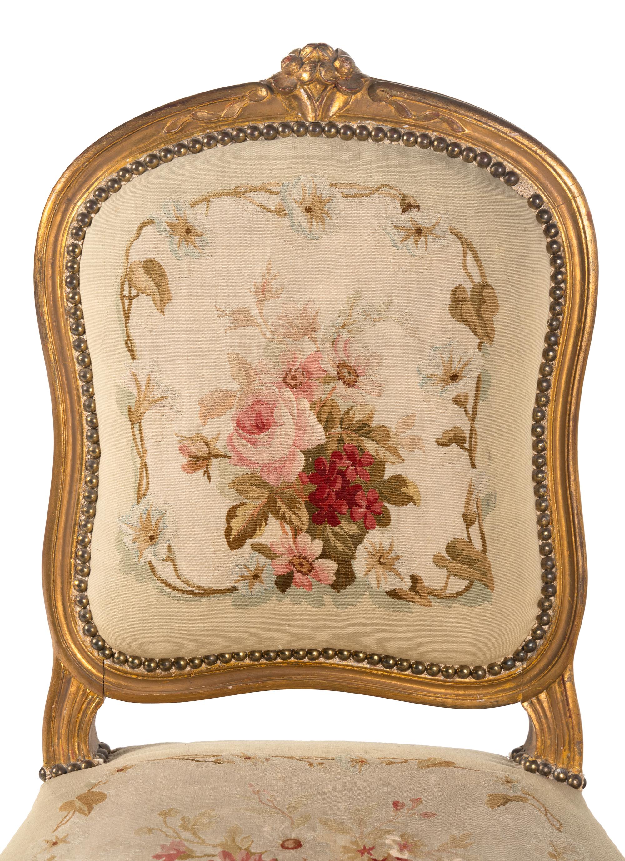 A Louis XV Style Giltwood Seven-Piece Salon Suite