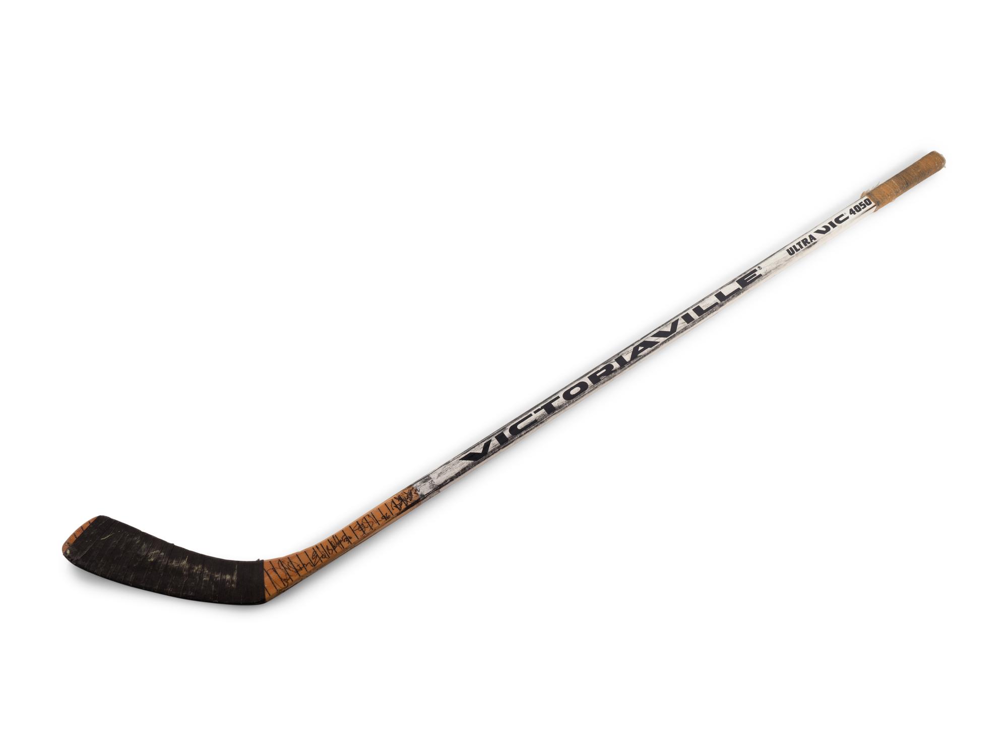 A Brent Sutter Game Used Hockey Stick Signed by Chicago Blackhawks Notables,