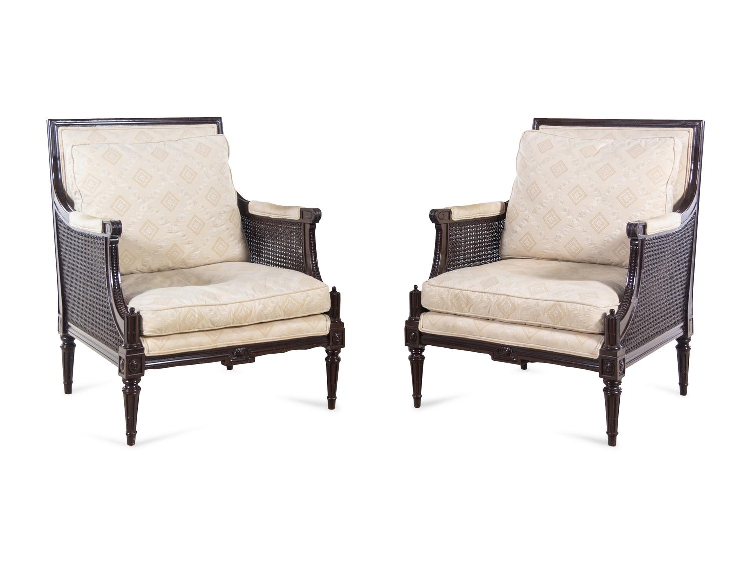 A Pair of Louis XVI Style Cane Upholstered Bergères