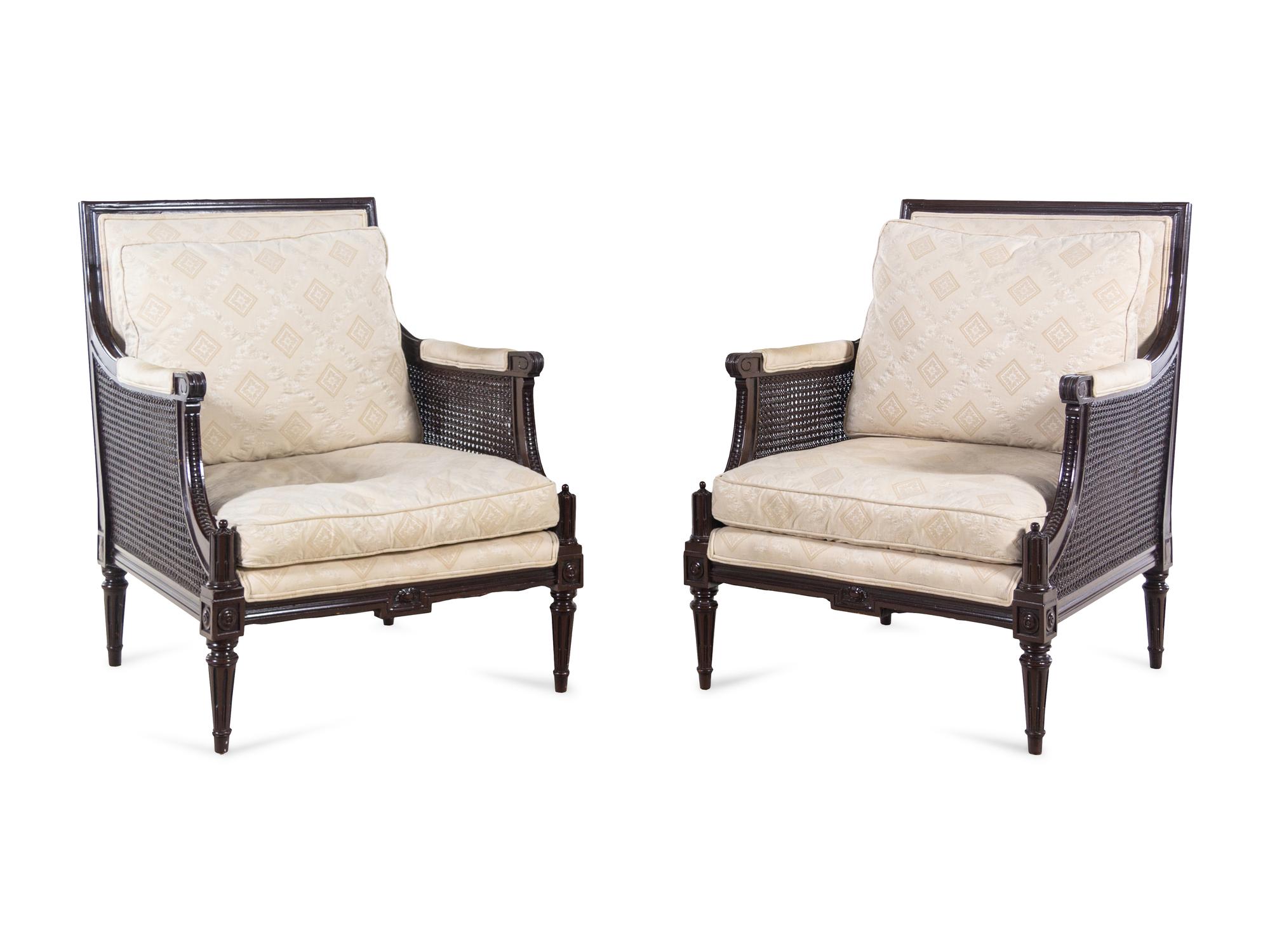 A Pair of Louis XVI Style Cane Upholstered Bergères