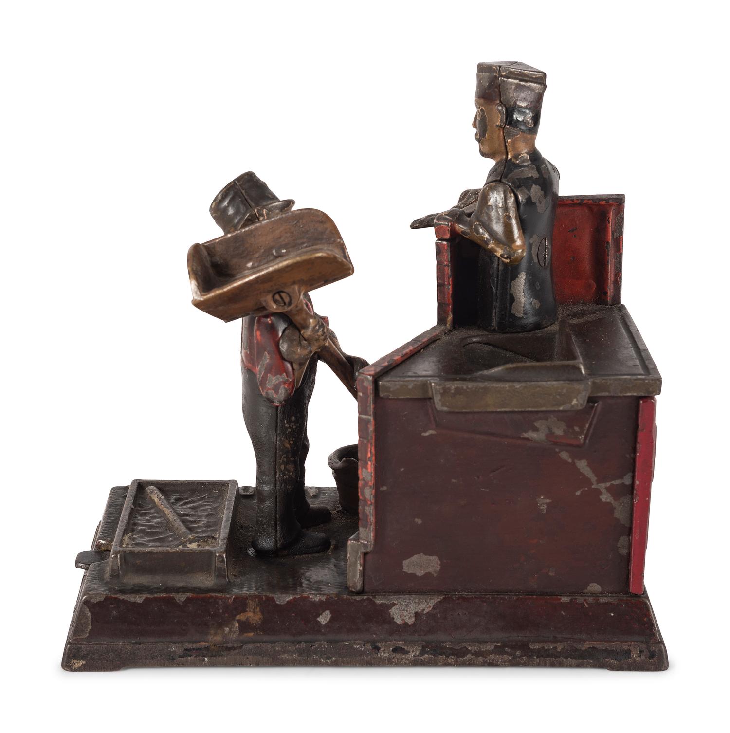 A Mason Cast Iron Mechanical Bank