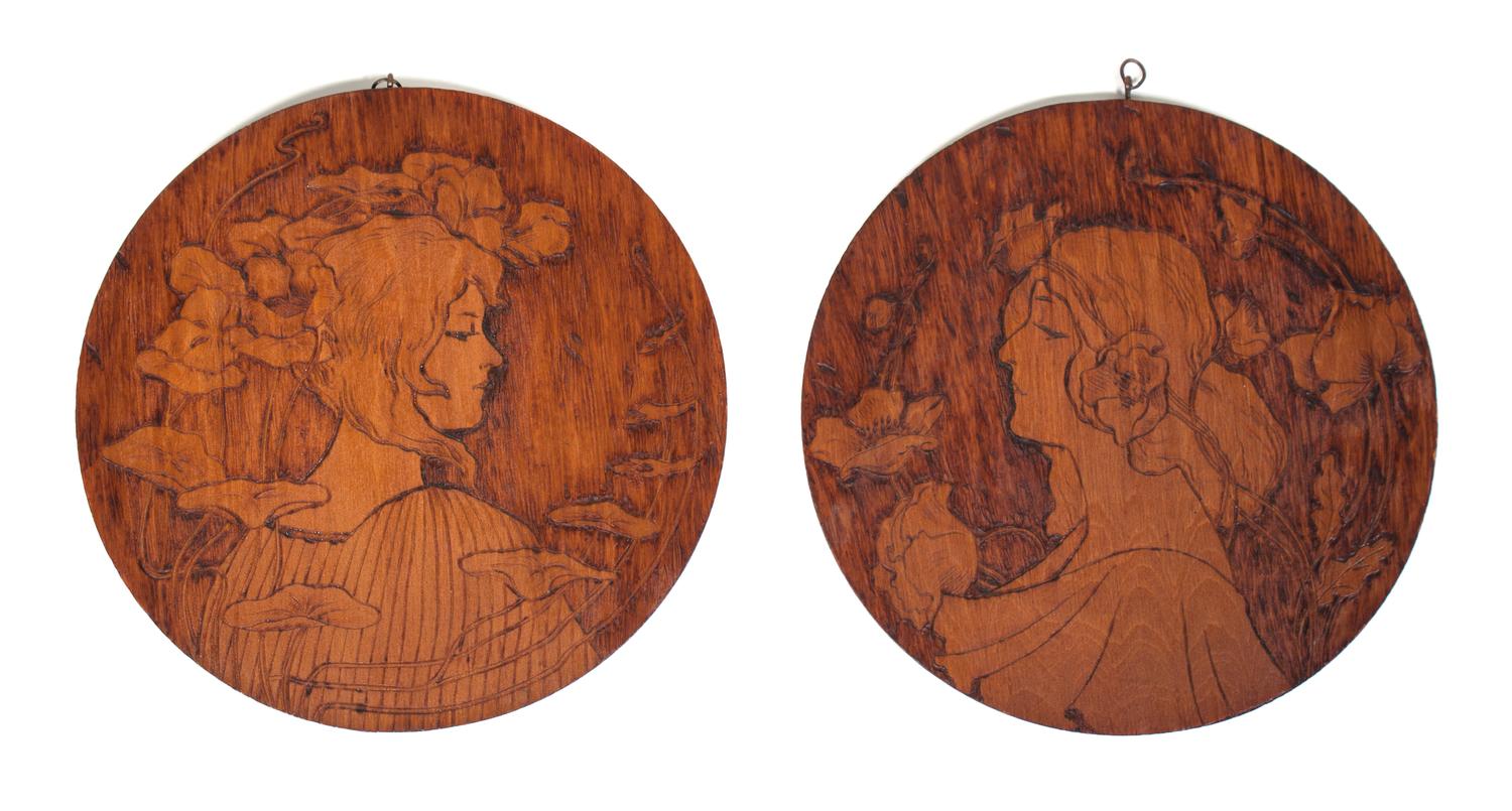 Two Art Nouveau Carved Wood Plaques Diameter 10 inches.
