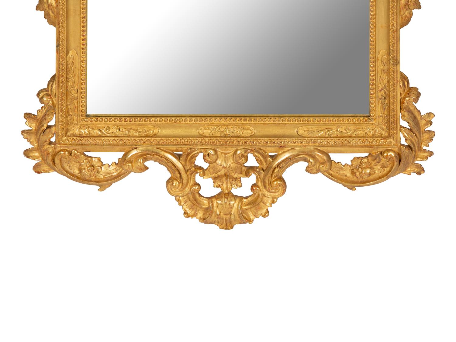 An Italian Baroque Style Giltwood Mirror