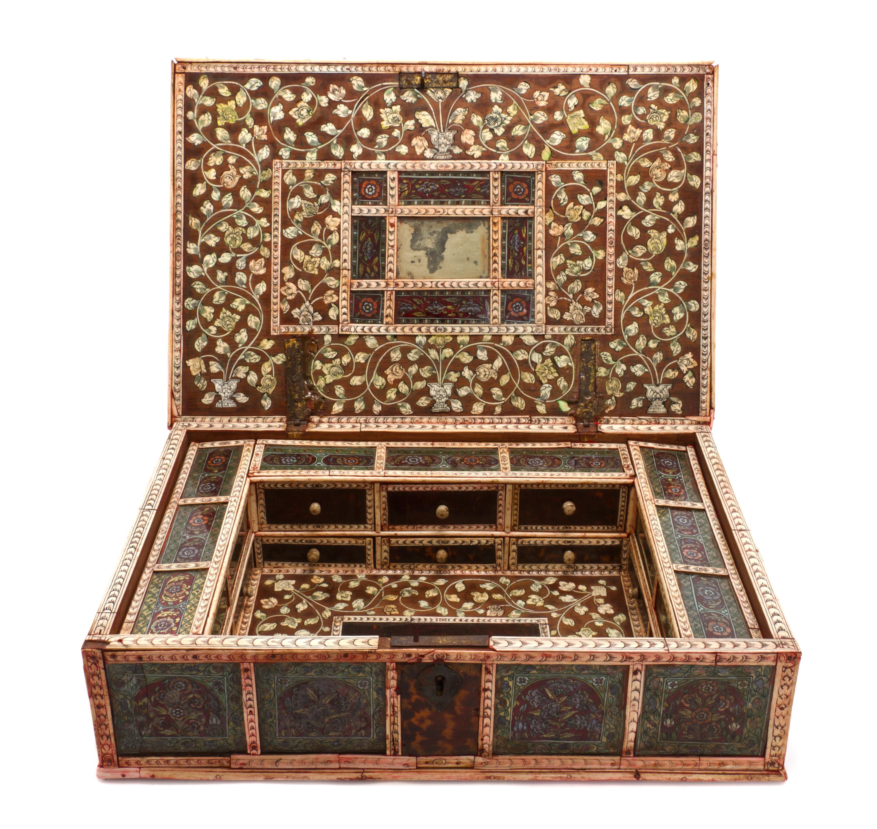 An Indian Reverse Painted Glass and Bone Casket, Height 4 7/8 x width 18 1/8 x depth 12 3/8 inches.
