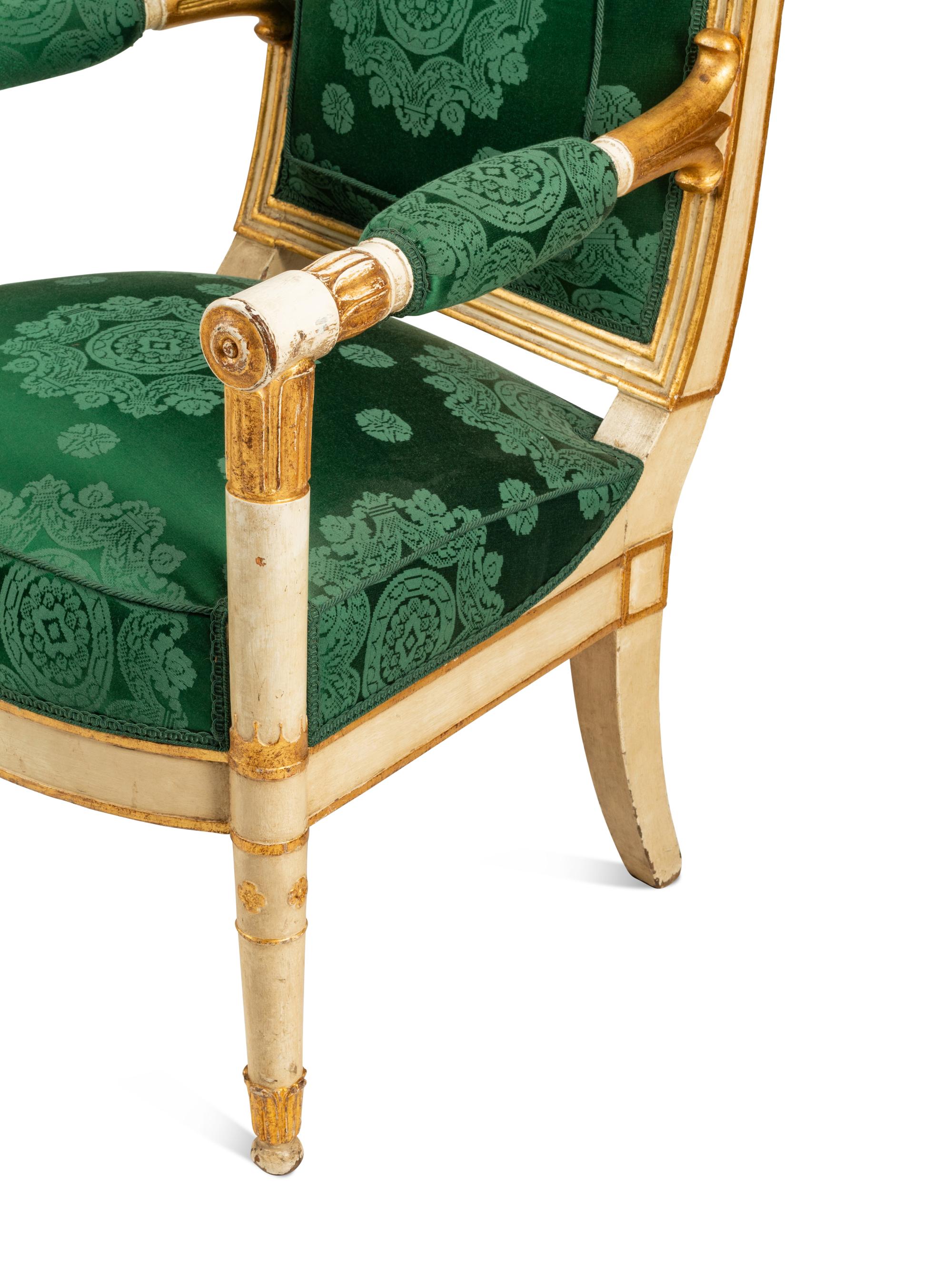 A Pair of Directoire White-Painted and Parcel Gilt Fauteuils