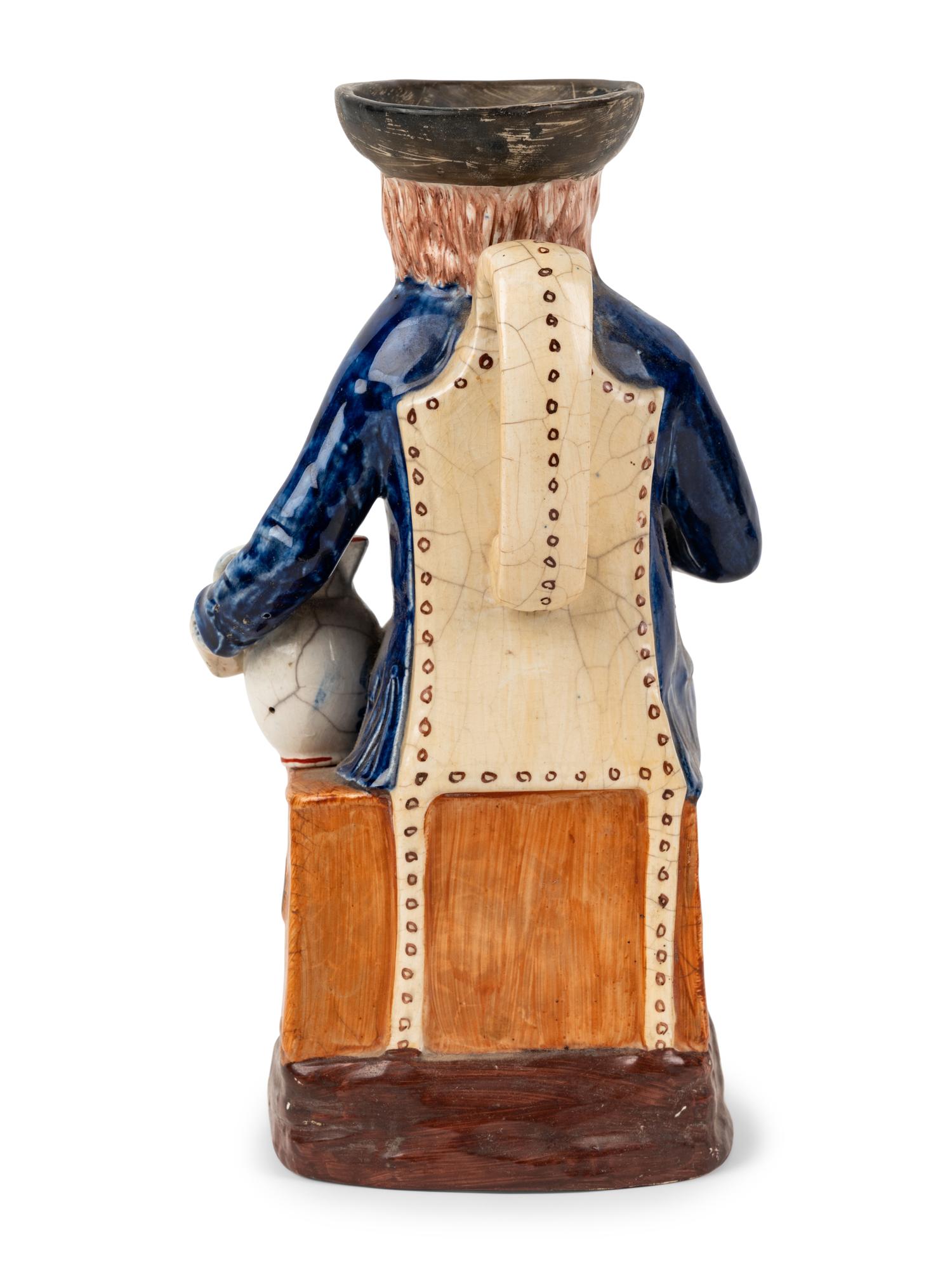 A Sailor or Apothecary Toby Jug